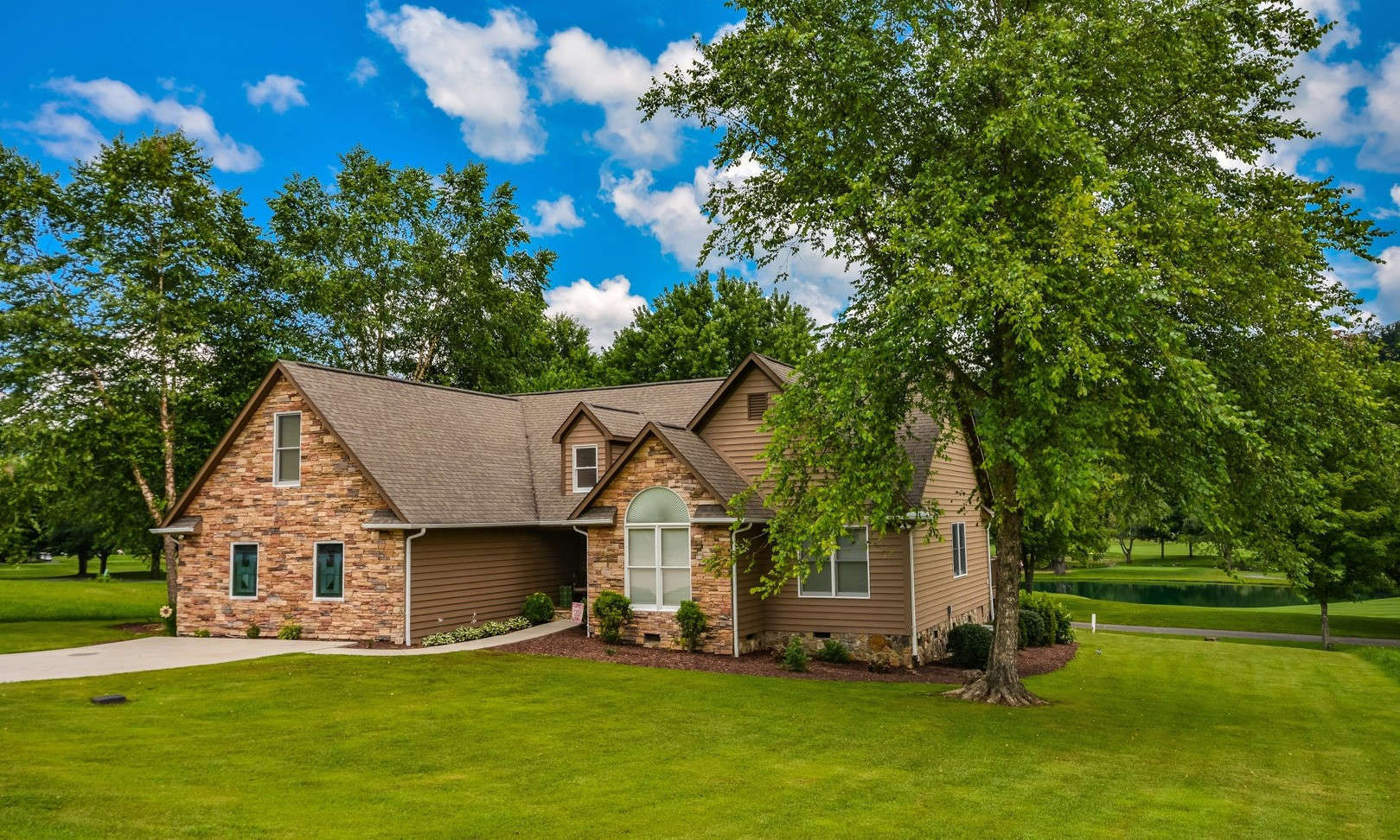 GOLFER'S DREAM! Experience the best of the NC High Country with golf course and mountain views with this 4-bedroom, 3-bath home located in Jefferson Landing Golf Course resort in the Jefferson area of Ashe County.