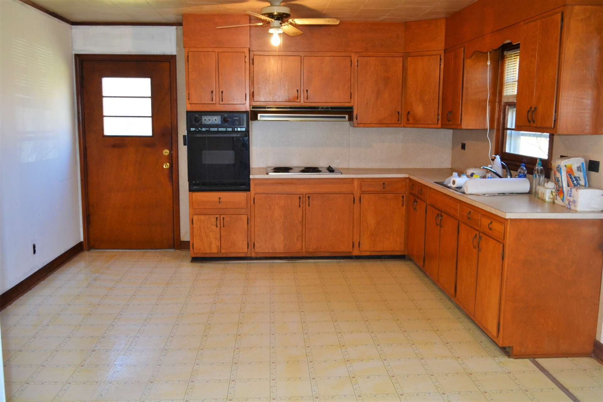 The classic farmhouse style kitchen and dining area is the hub of the home and offers plenty of work and storage space, including a pantry.