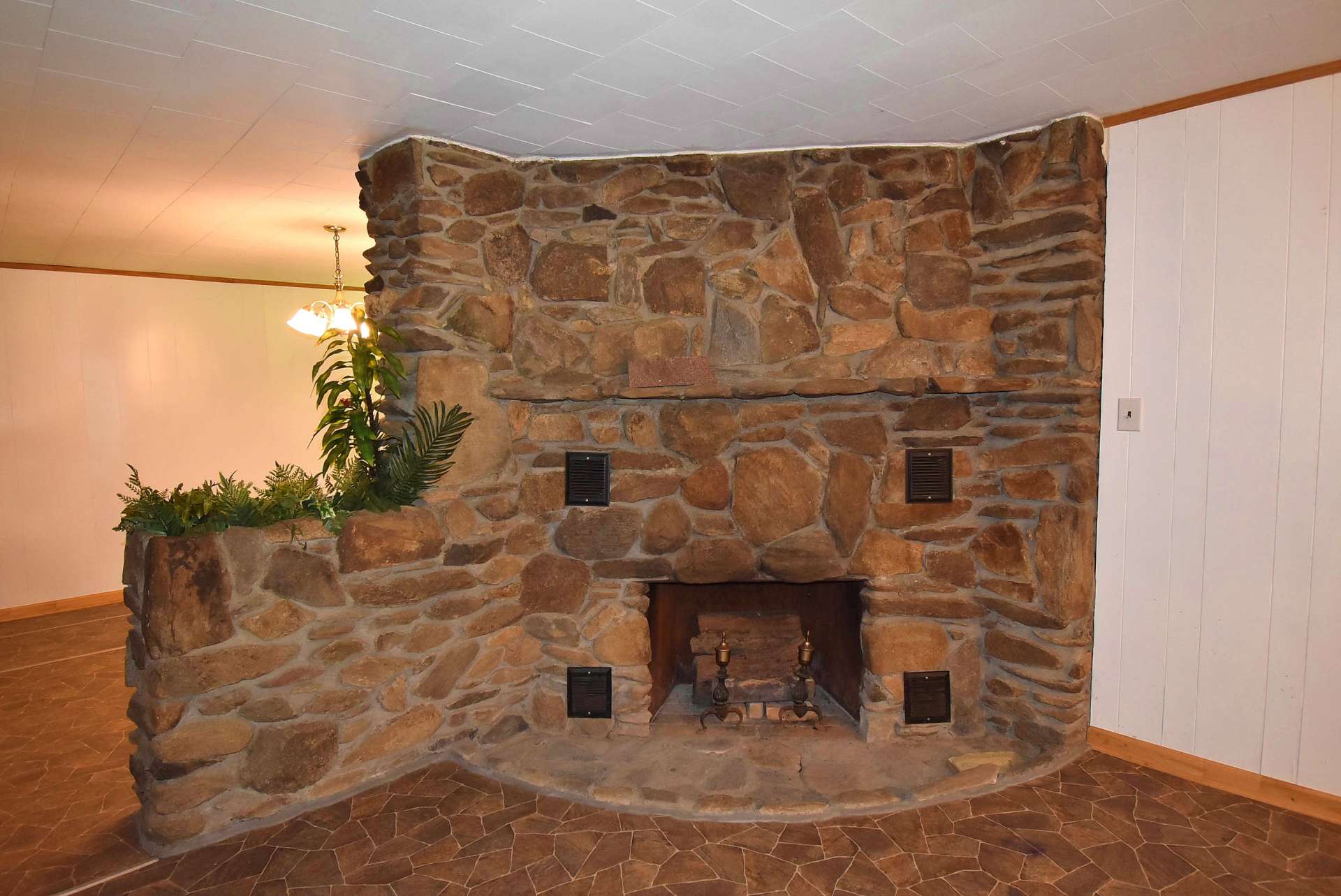 You will love spending  cool winter evenings in front of this fireplace with a crackling fire and the smell of home baked goodies coming from the kitchen.