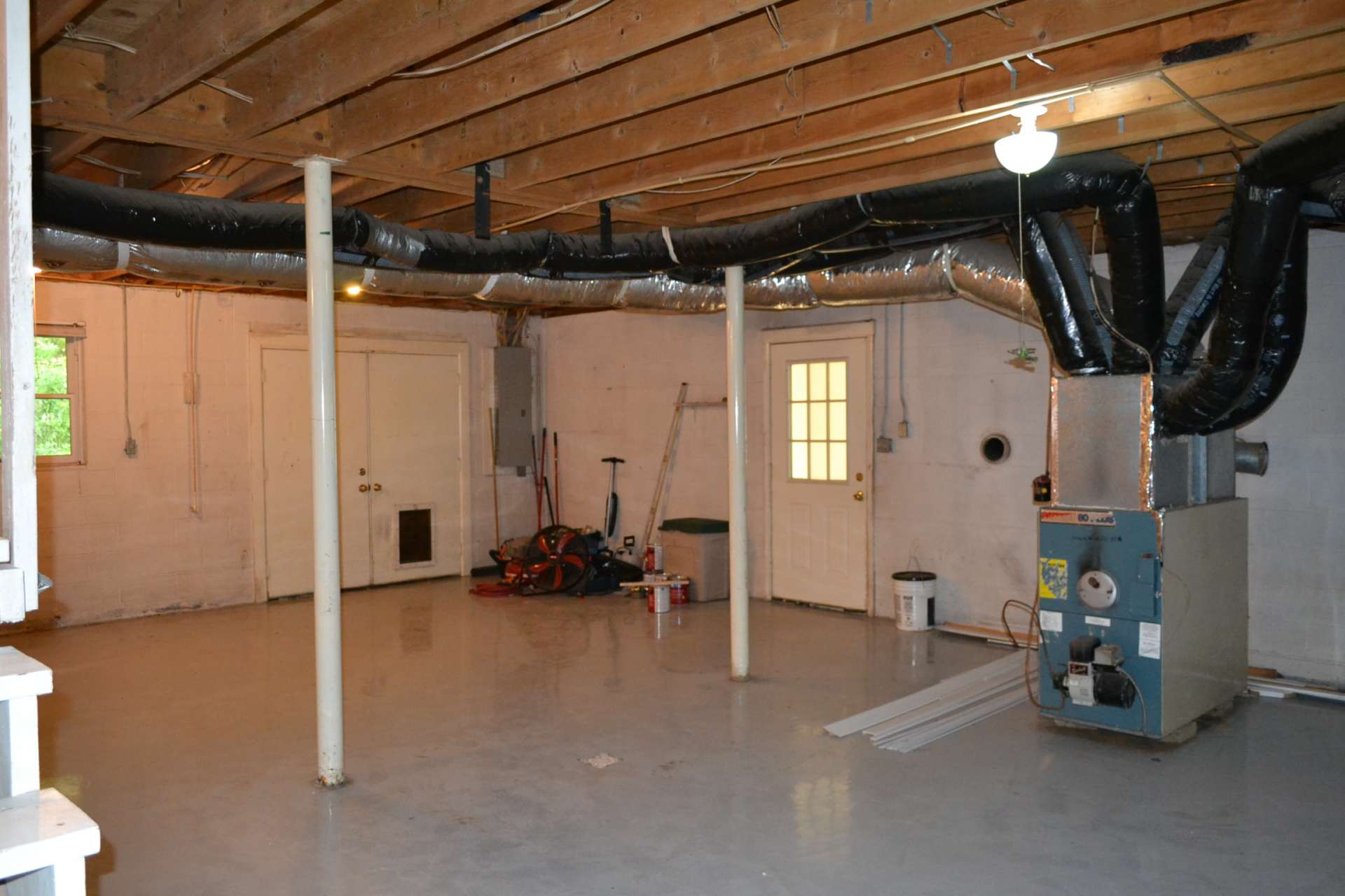 The lower level can be easily finished for additional living space.  The large garage area can be accessed from this area.