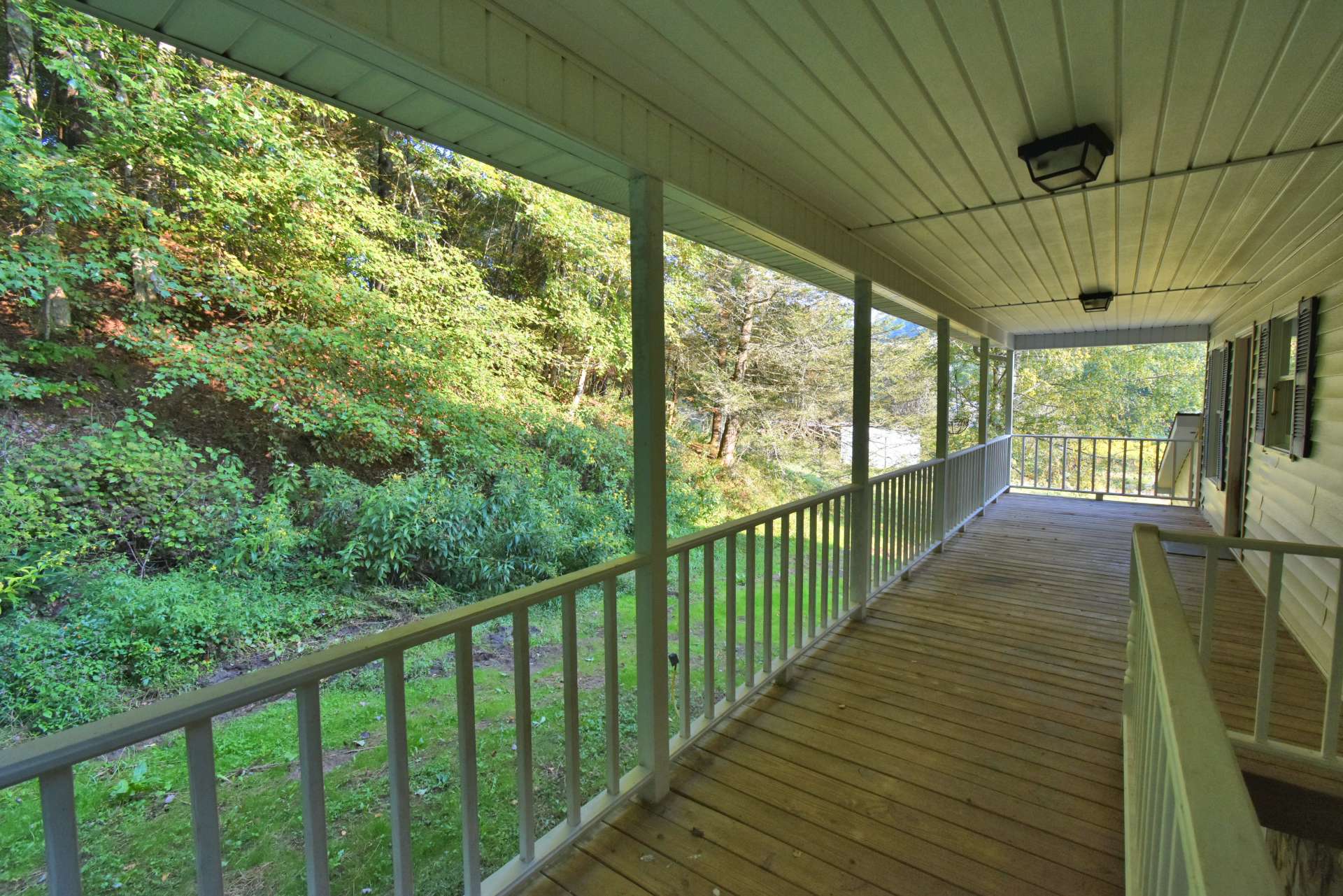 You can also enjoy the sounds of the waterfall from the back porch.  A great place to spend the afternoon with a good book.