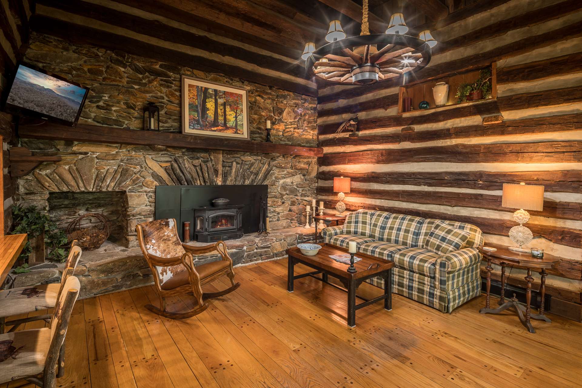 Perhaps the heart of the home is the grand fireplace made of stones from Mount Jefferson.