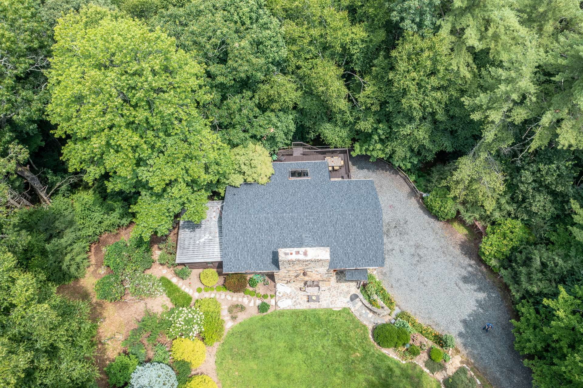 These aerial views show the privacy of the 7+ acre park-like setting.