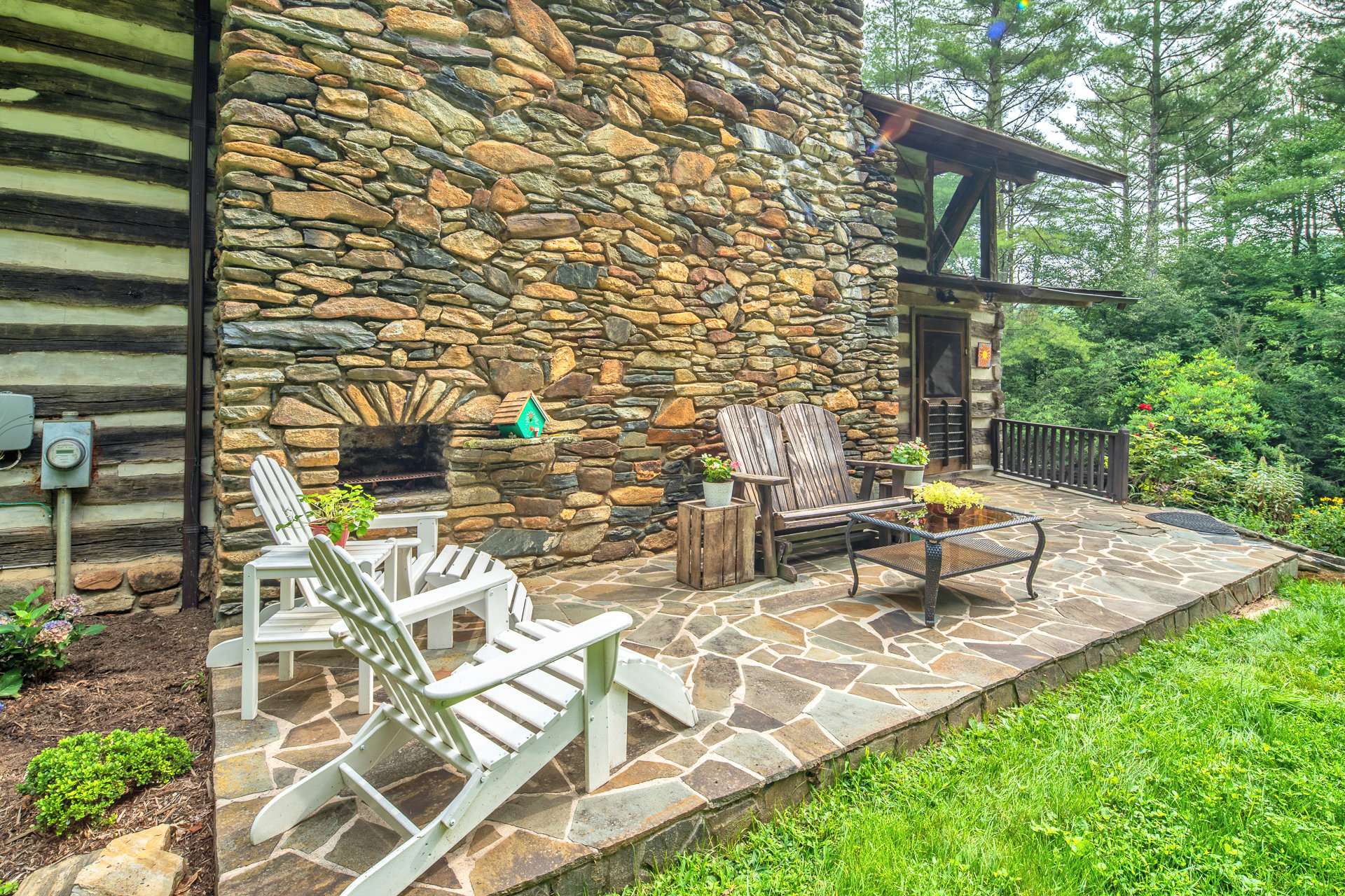 Read a book or entertain your friends and family on the stone front patio, complete with a stone oven.  This property is truly a work of art.