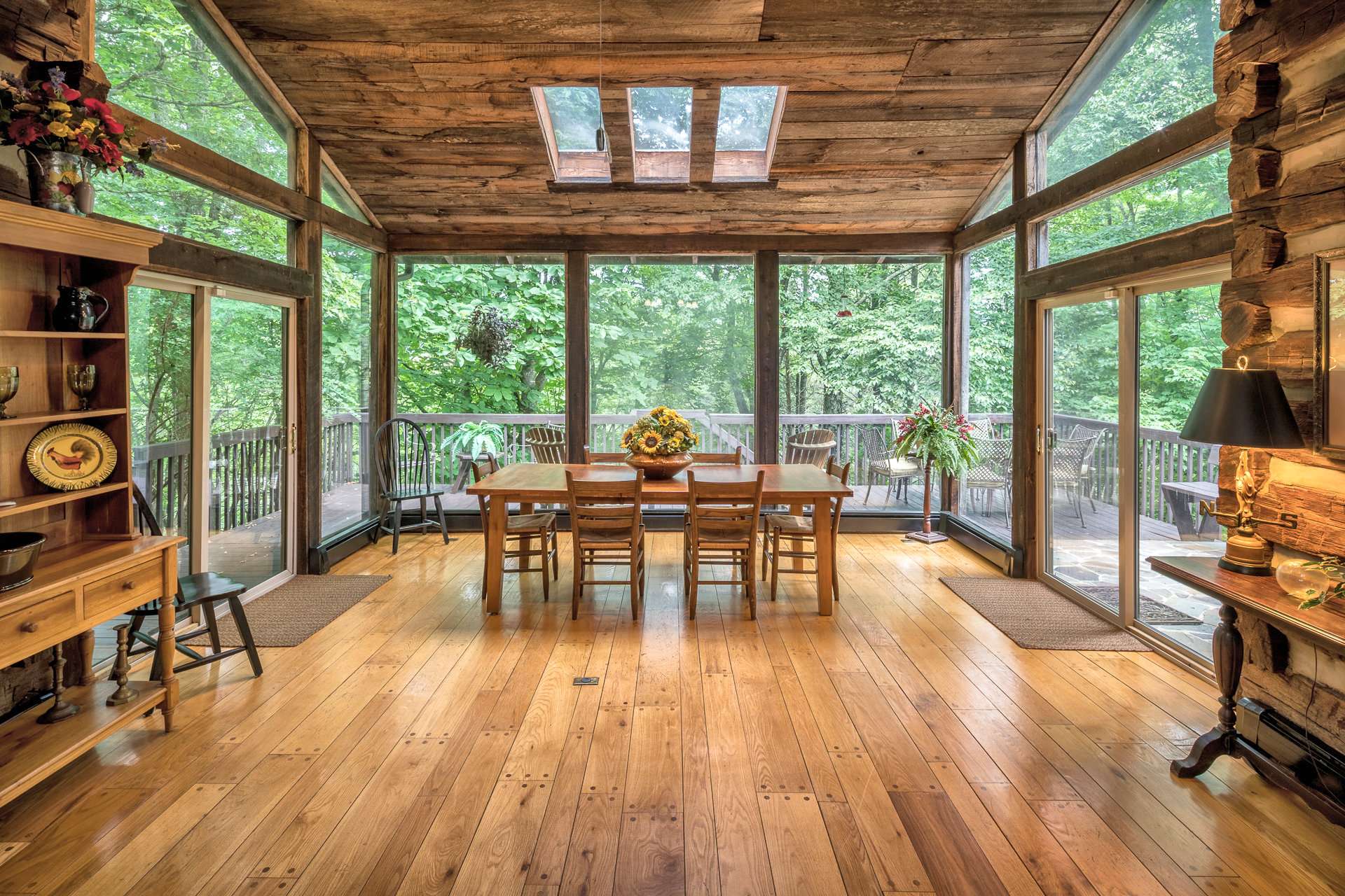 Enjoy your holiday gatherings in the glorious dining room with walls of glass filling the room with natural light.