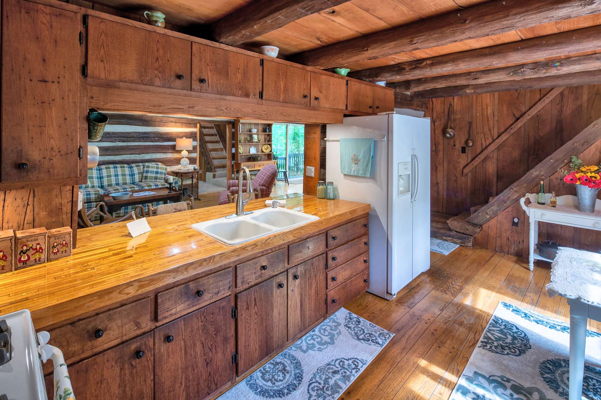 The kitchen boasts countertops made of reclaimed wood from a lane in a former West Jefferson blowing alley