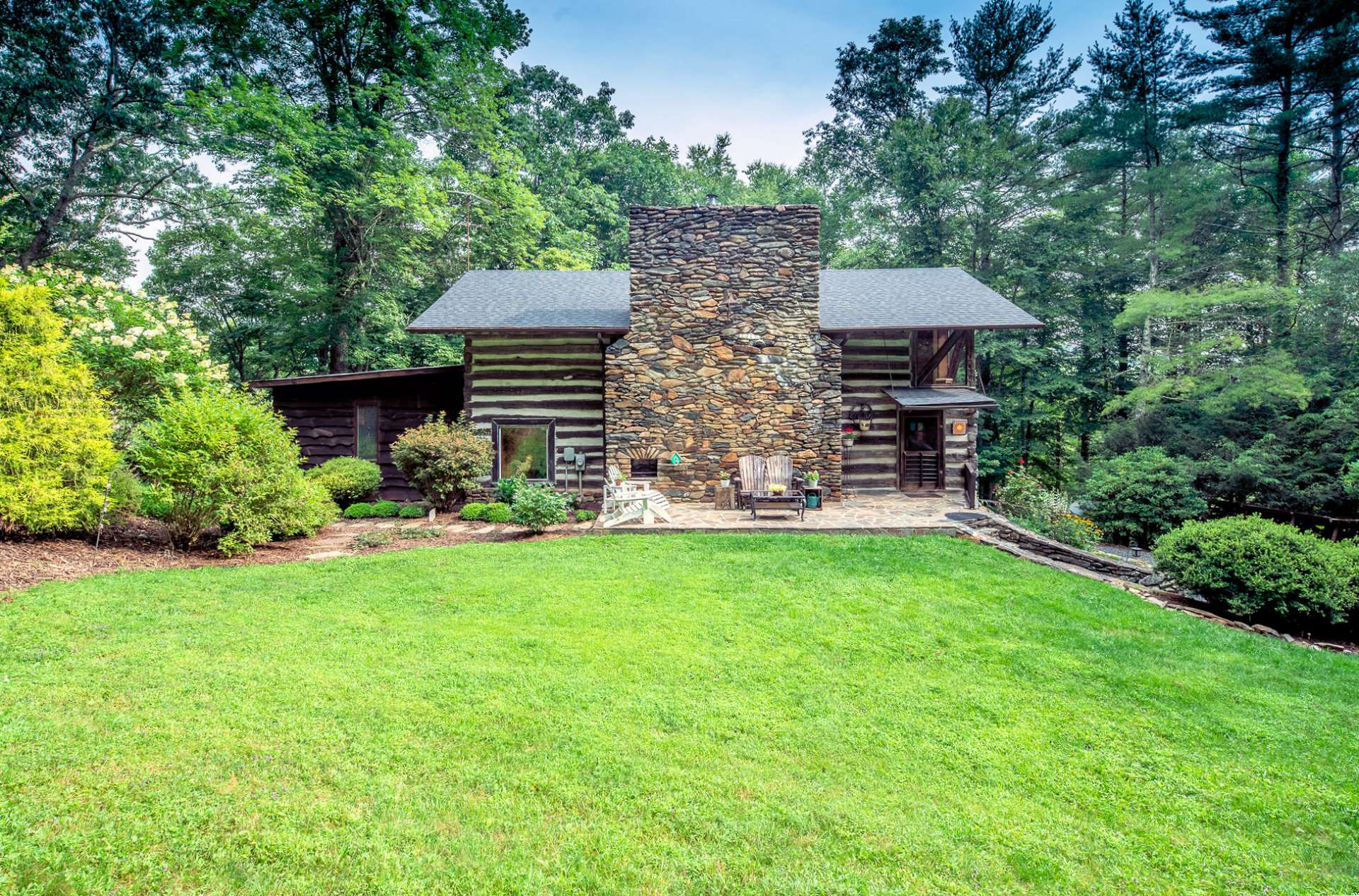 Call today for additional information on this truly unique hand hewn authentic log cabin reconstructed from a circa 1848 chestnut log barn and boasting handcrafted details.