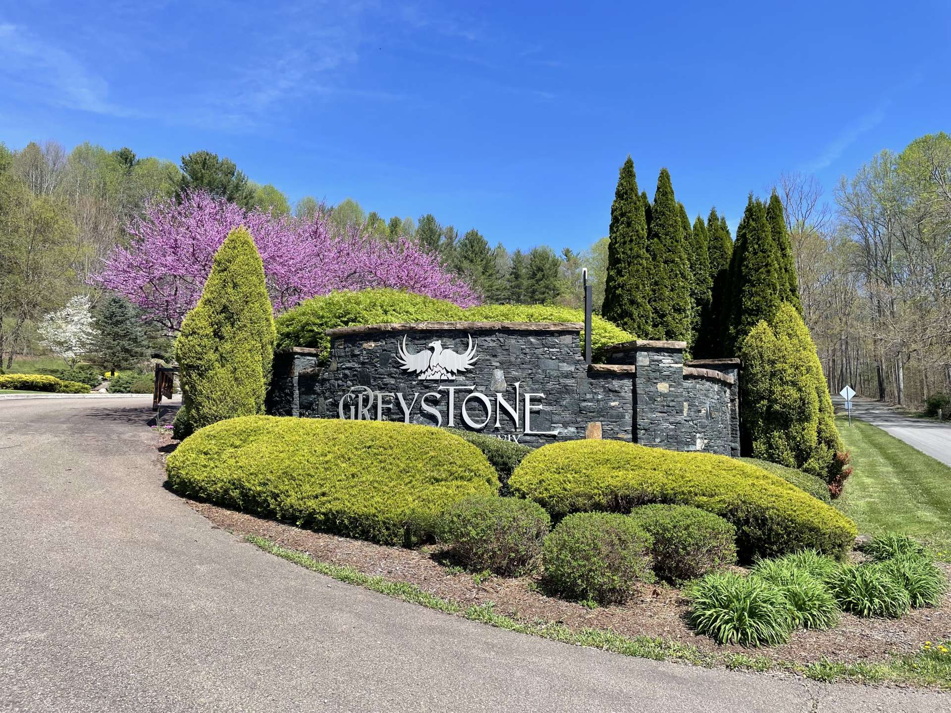 Well landscaped entry to Greystone at Phoenix.