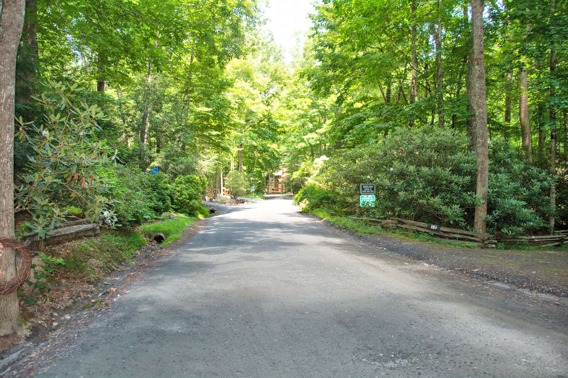 Quiet private streets canopied with native hardwoods, evergreens, and mountain foliage.