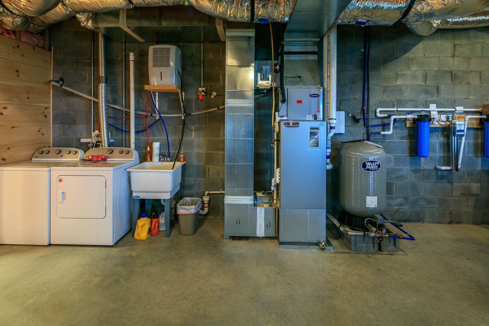 The laundry area is on the lower level.  This area can be easily converted to additional living space if needed.