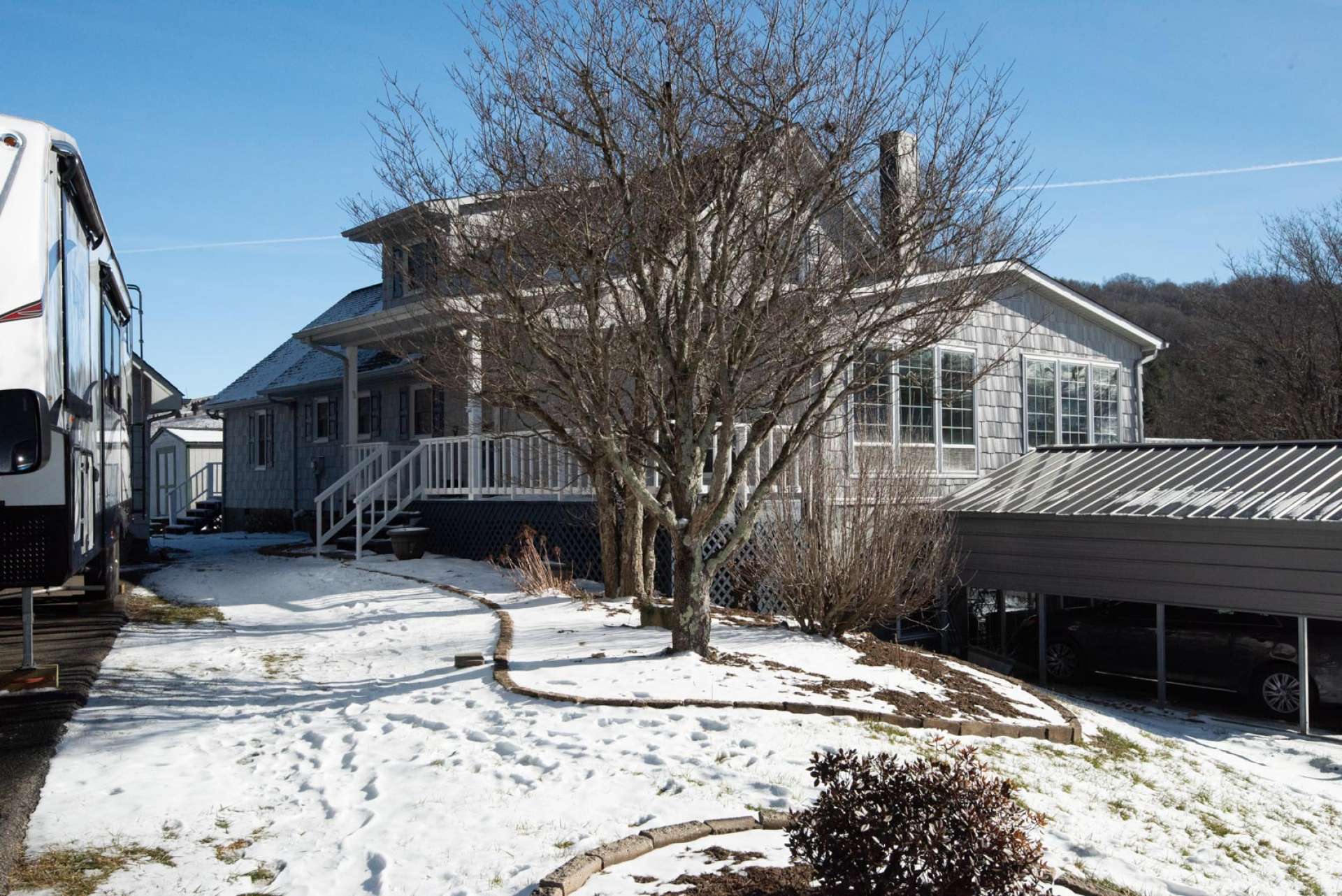 This home also offers a detached 3-car garage with storage overhead, and RV/camper hook up.