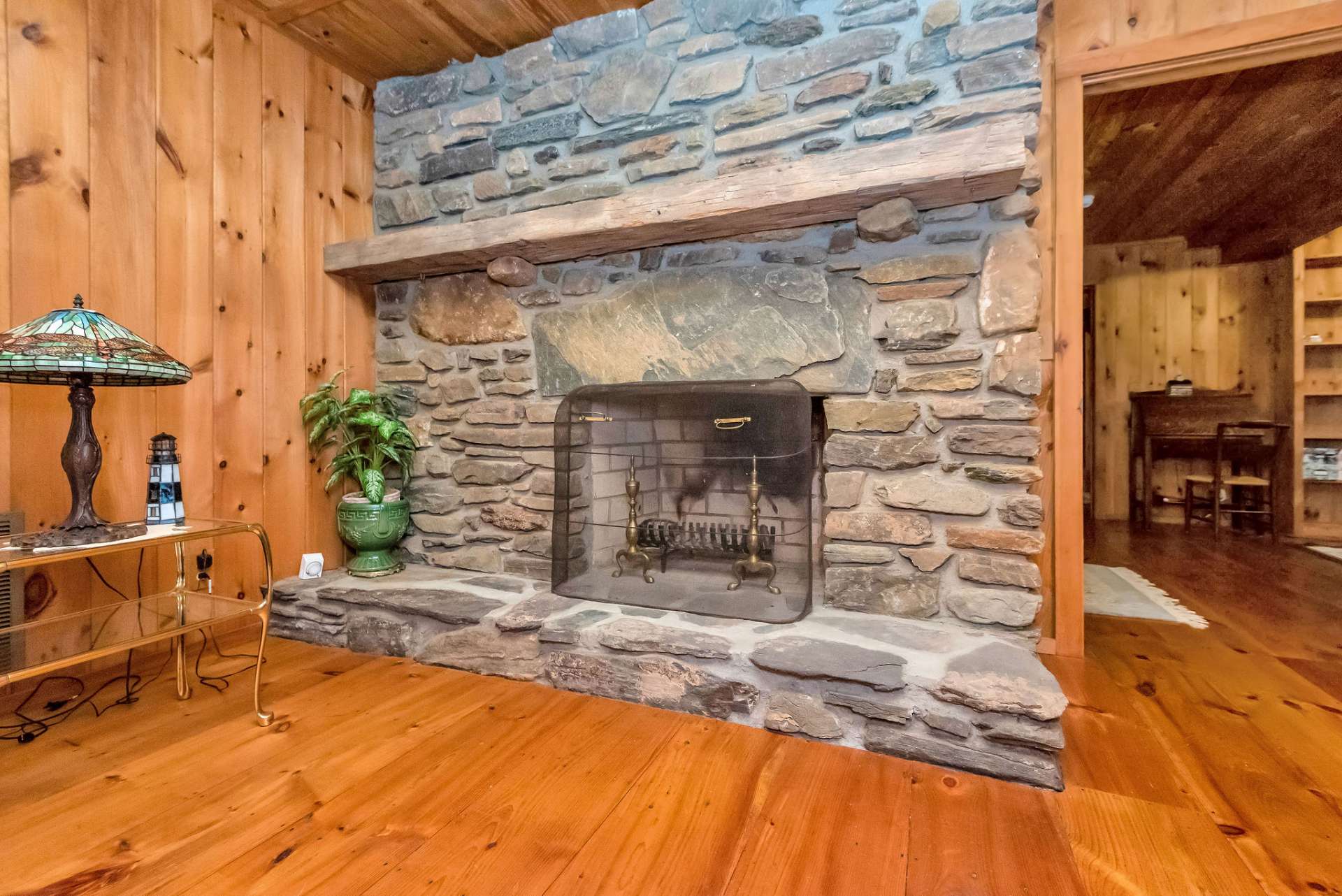 The family room offers a wood burning fireplace for the lodge campfire feel.