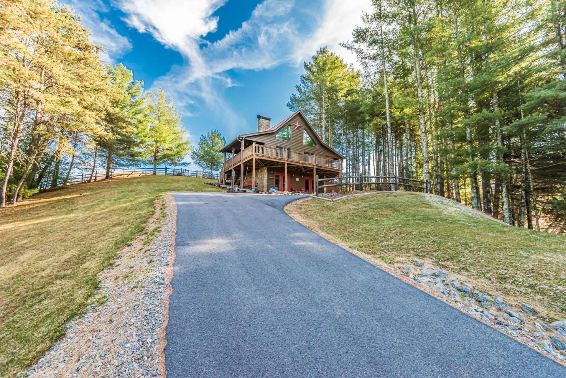 A paved drive leads the way to your mountain home.