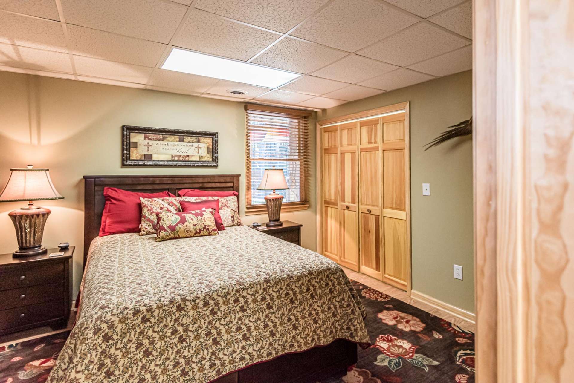 This lower level bedroom features double closets and is nicely sized.