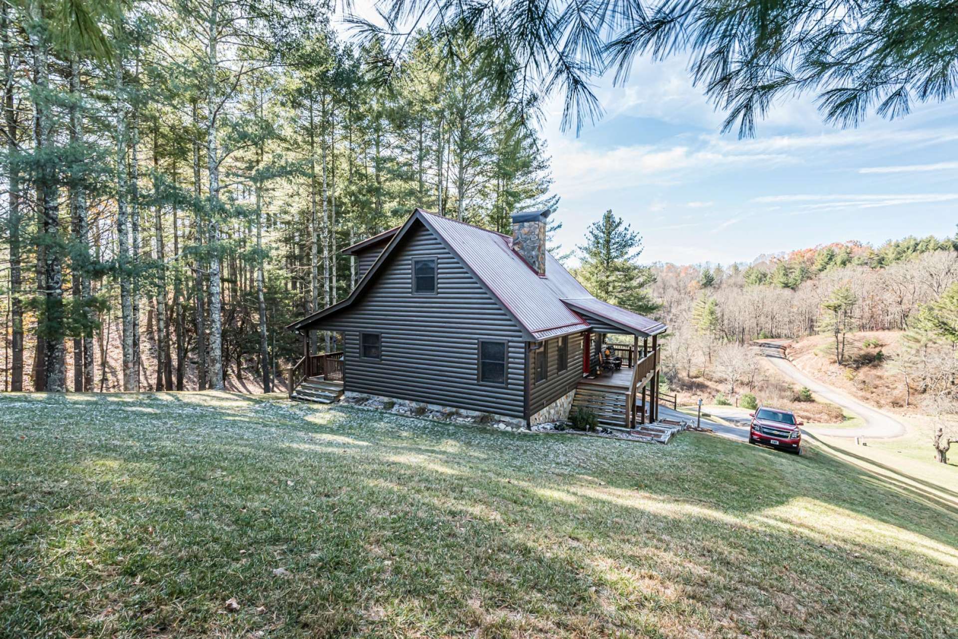 You will enjoy the serenity of the mountain views and the surrounding countryside from the covered front porch.