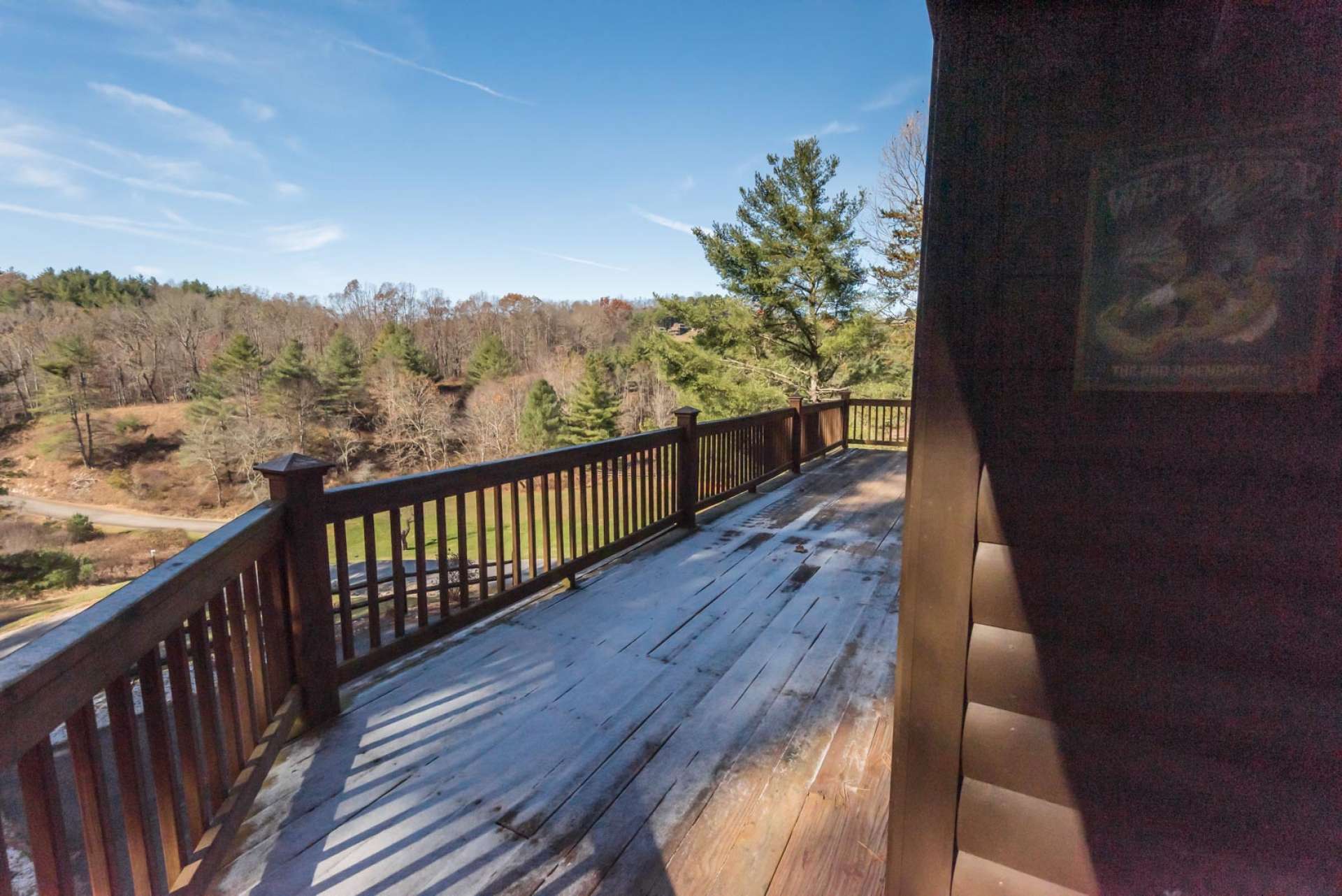 The main level offers a partially covered deck that wraps around three sides of the cabin affording you plenty of space for outdoor entertaining. Or, simply enjoy a relaxing afternoon with your favorite book and the sounds of Nature all around you.