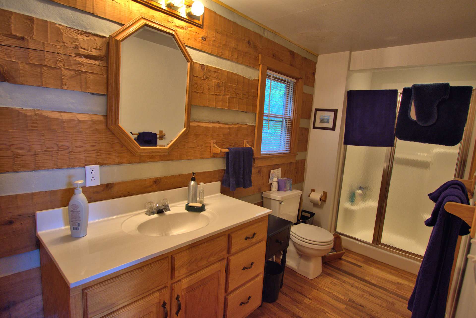 The main level also offers a full bath with walk-in shower.