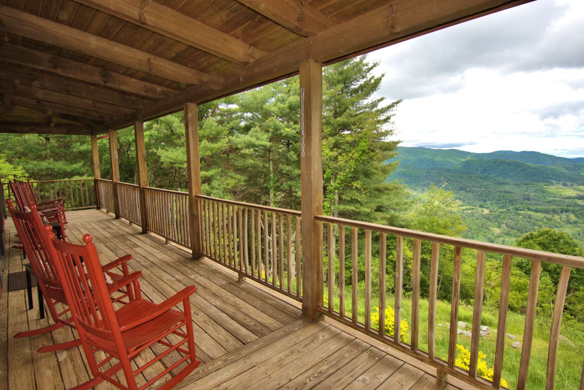 Relax on the partially covered deck wrapping around three sides of the cabin and enjoy gorgeous long range views and the gentle whispers of the breezes through the trees.  No honking horns, no noisy machinery, or sirens.