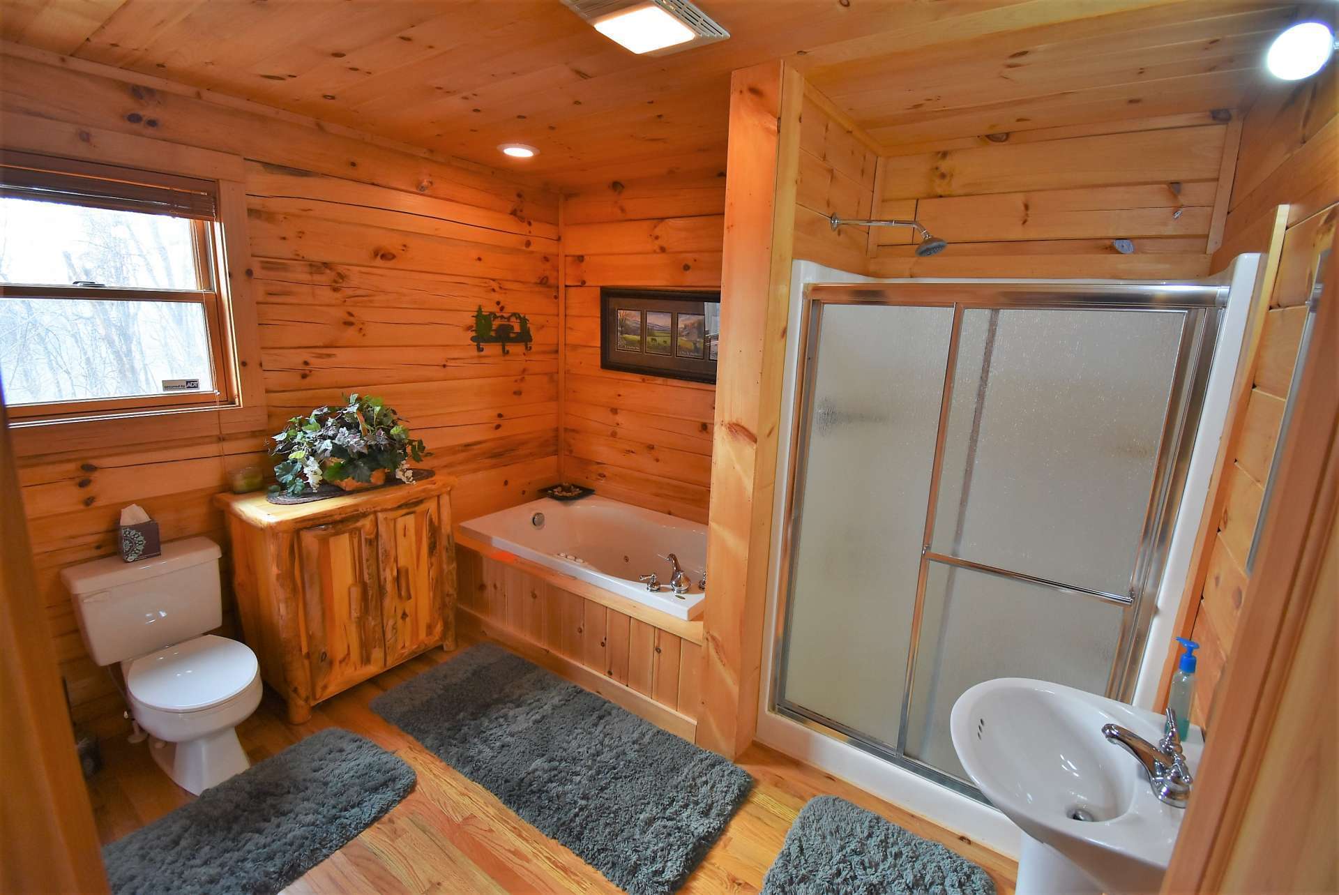 The master bath offers a jetted tub and separate shower.