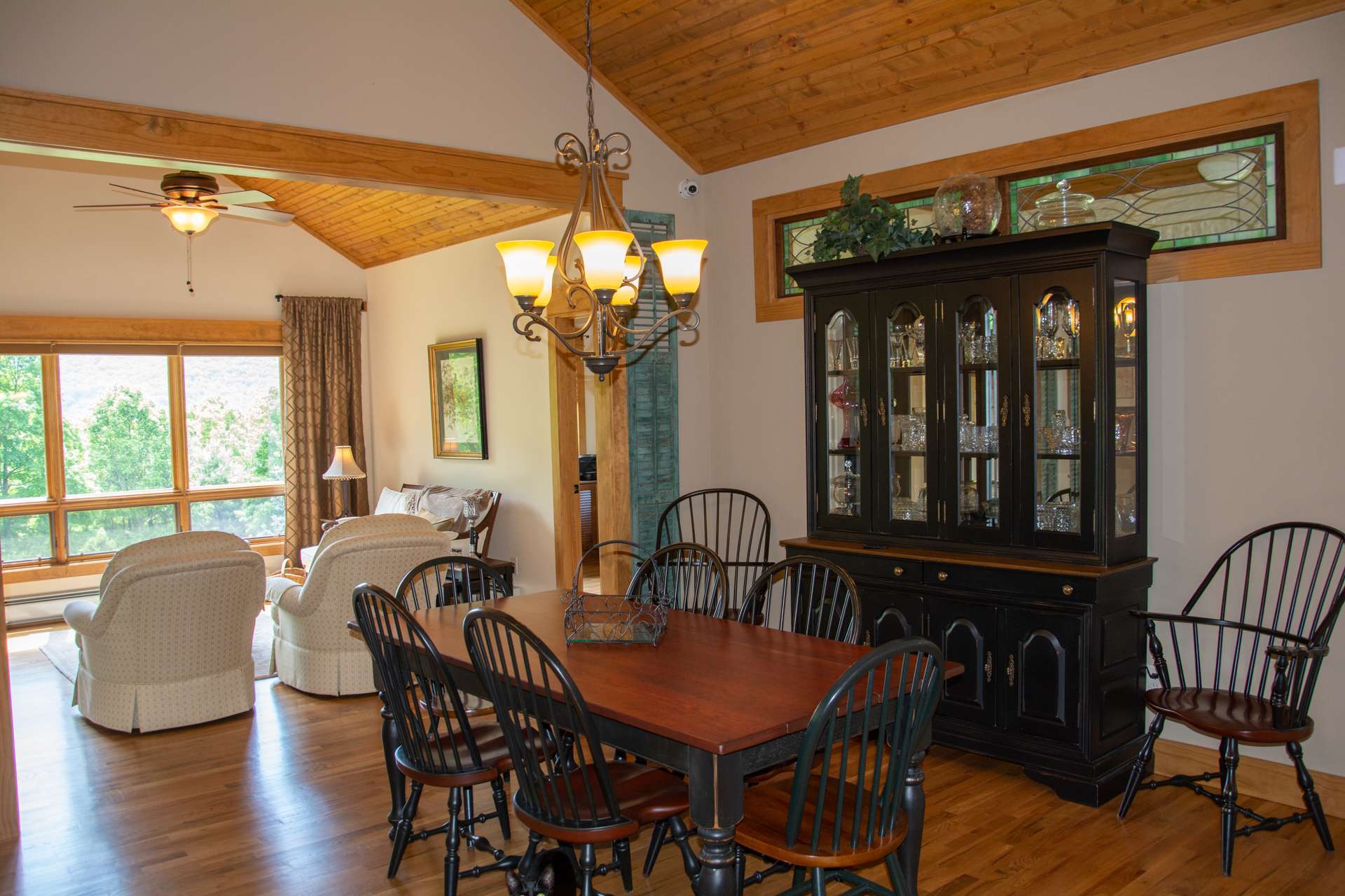 Adjoining the kitchen is a beautiful formal dining area that is also accessed from the den or morning room.