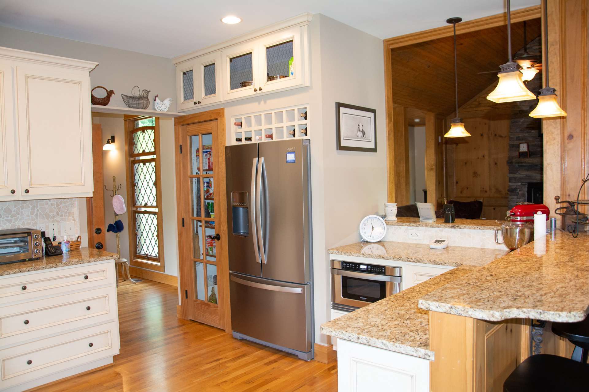 You will appreciate the work and storage space in the kitchen.