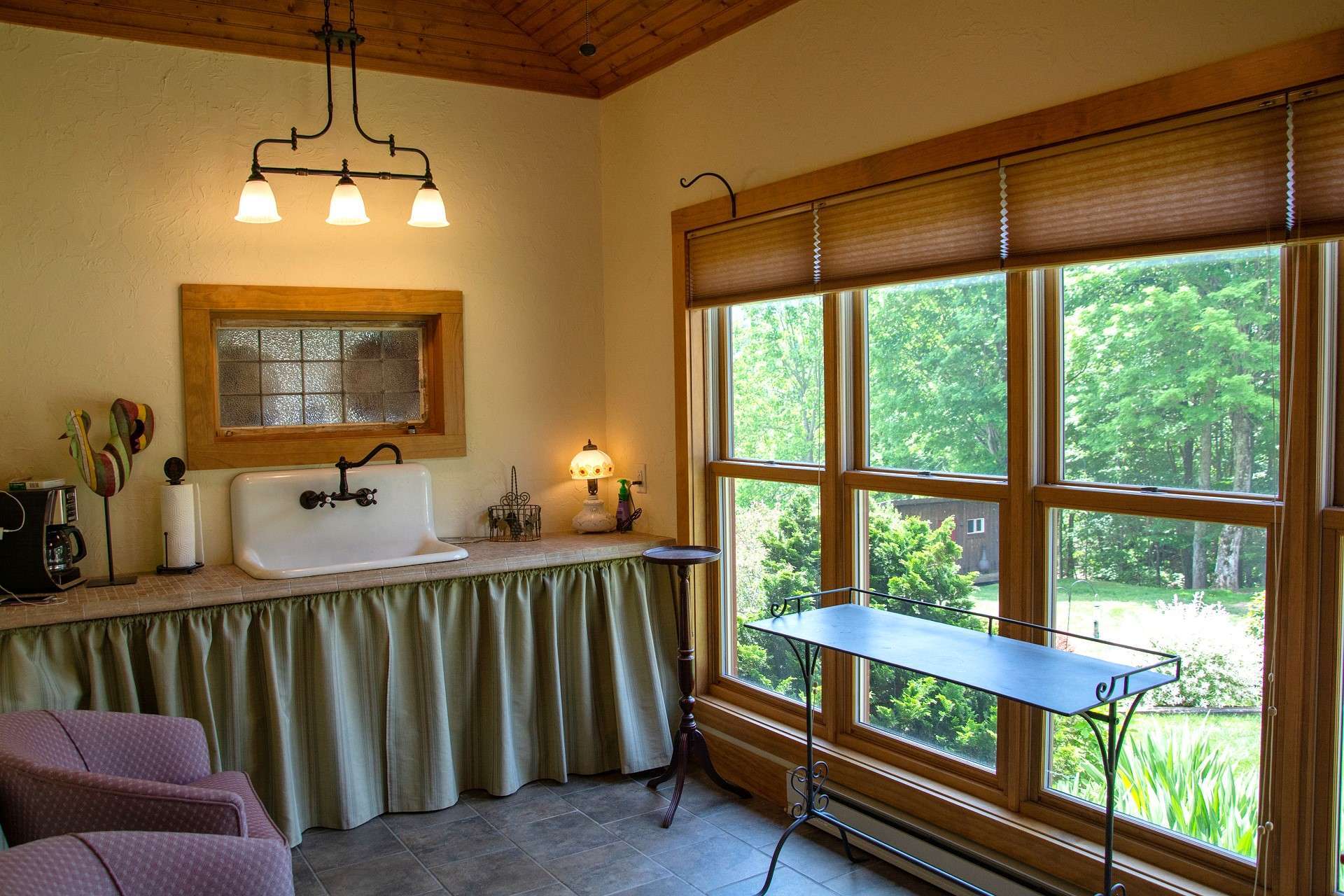 This room filled with natural light is an ideal option for a mudroom, sunroom, craft room, or plant sanctuary.