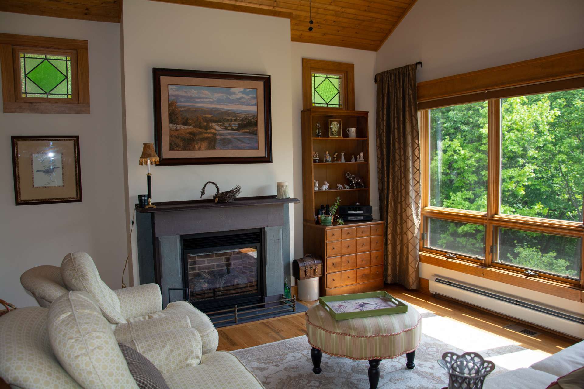 The morning room, with lots of windows and a gas log fireplace, is a great spot for relaxing with the morning news and a cup of coffee.