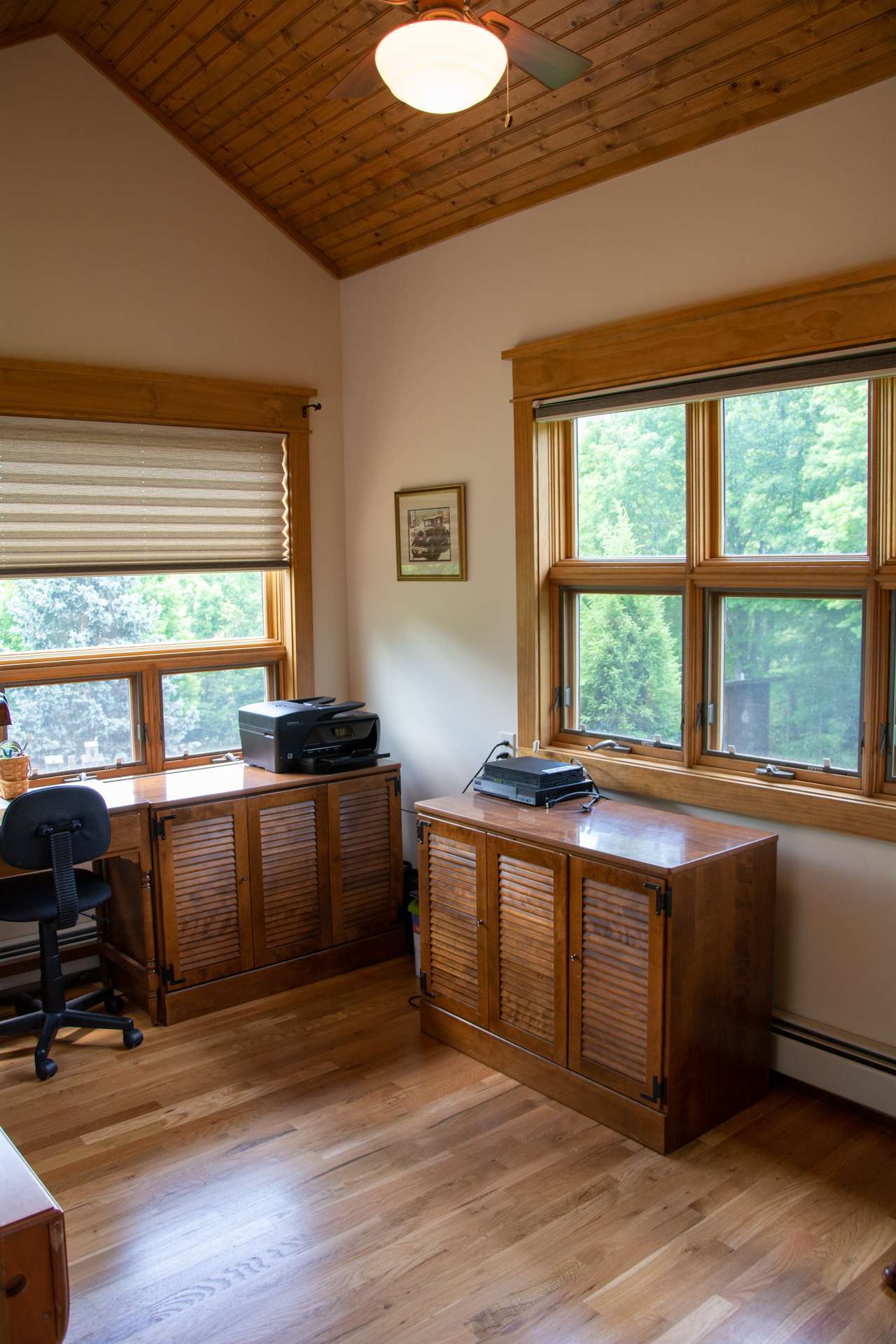 The office is spacious with lots of windows overlooking the gardens and pond.