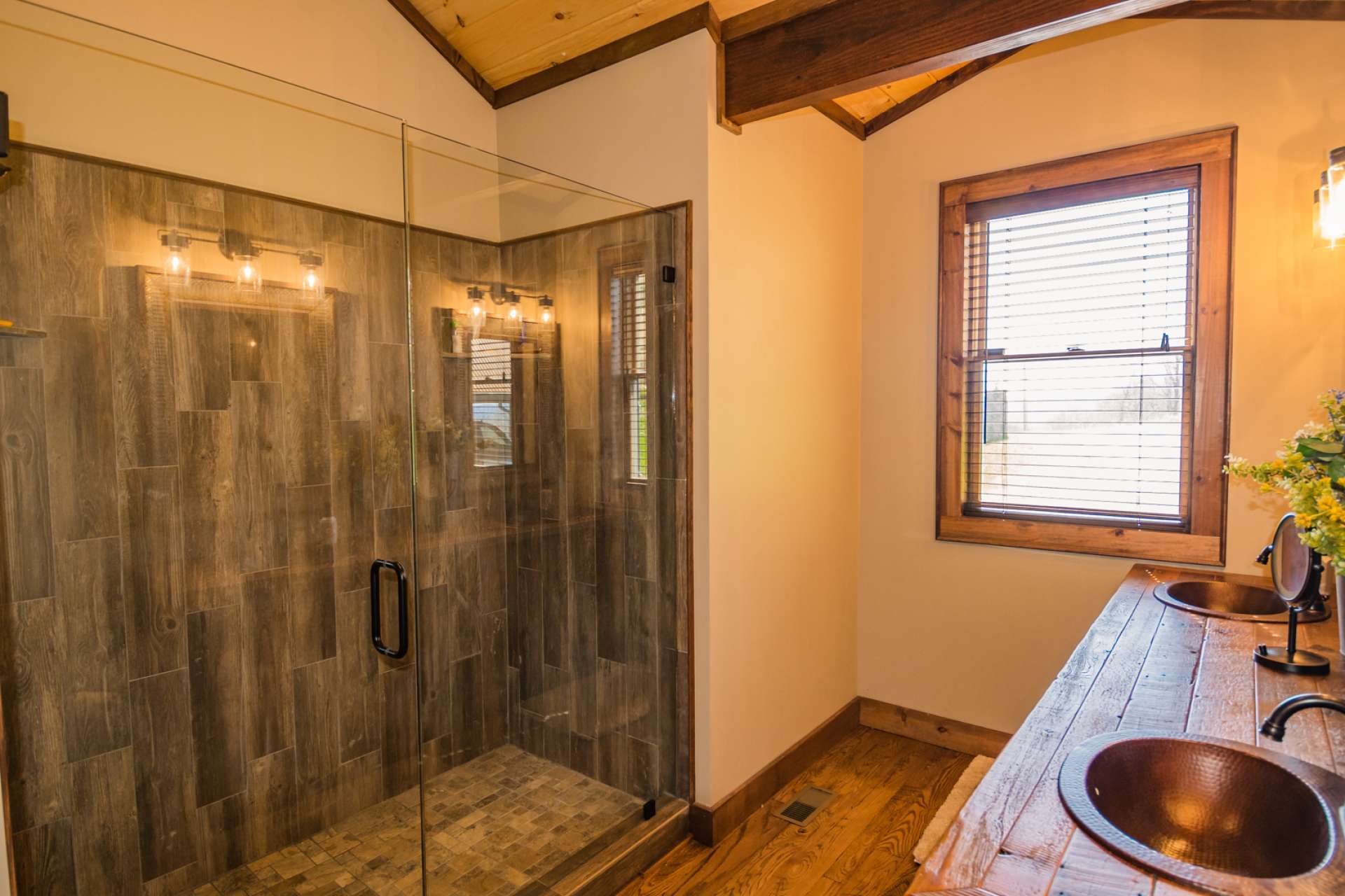 A guest bath and laundry room complete the main level.