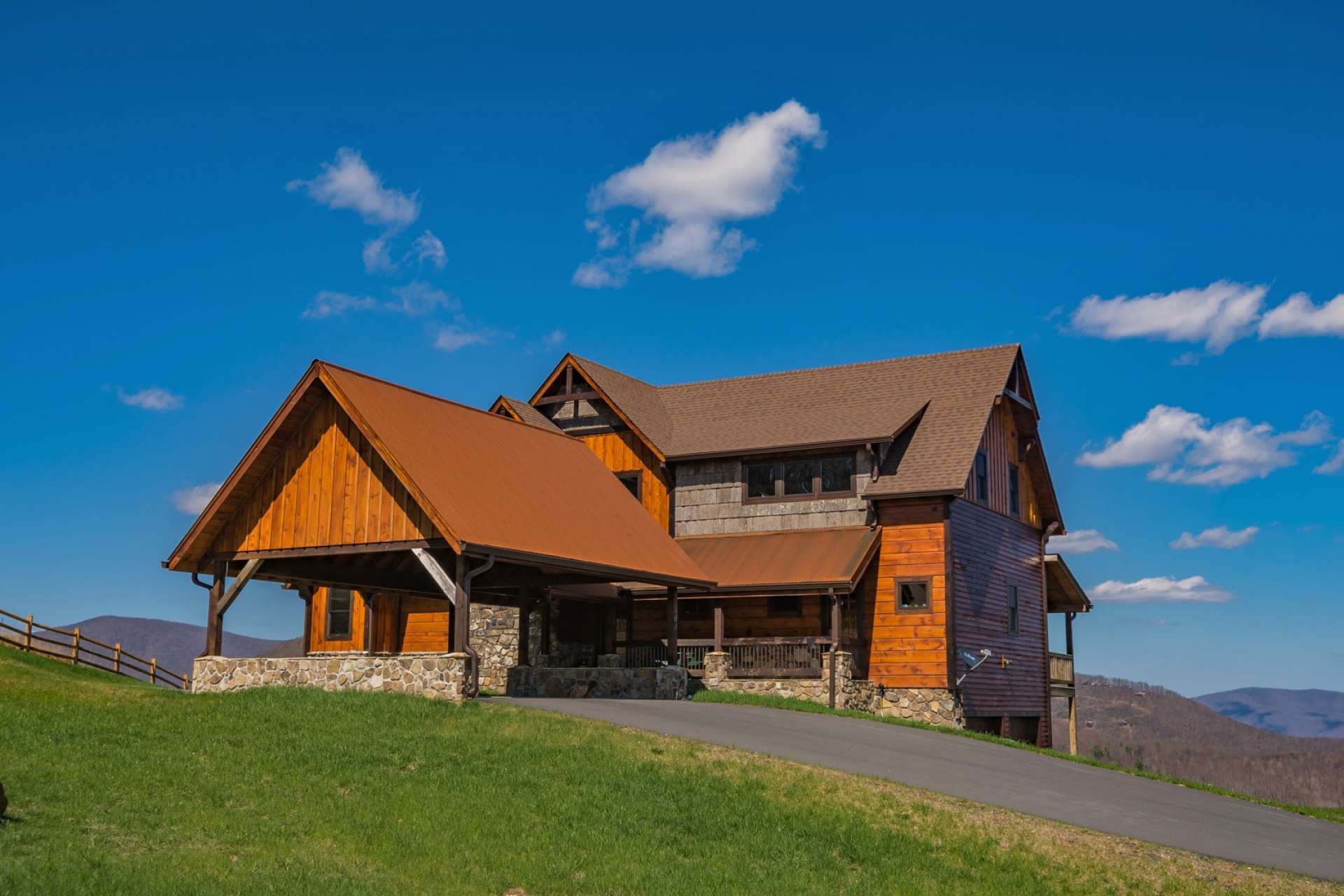 The  home is sited on the 1.77 acre setting to  take advantage of the  views and embrace the majesty of the NC Mountains at almost 4,000 feet in elevation.