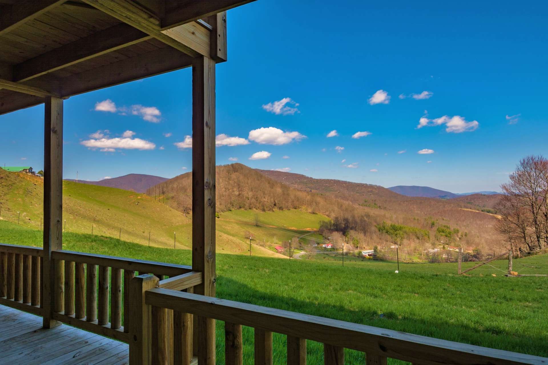 Blending into the mountain setting as if it were part of the original landscape, this  Adirondack style home offers views that include Grandfather Mountain  and change with all four seasons in the North Carolina mountains.