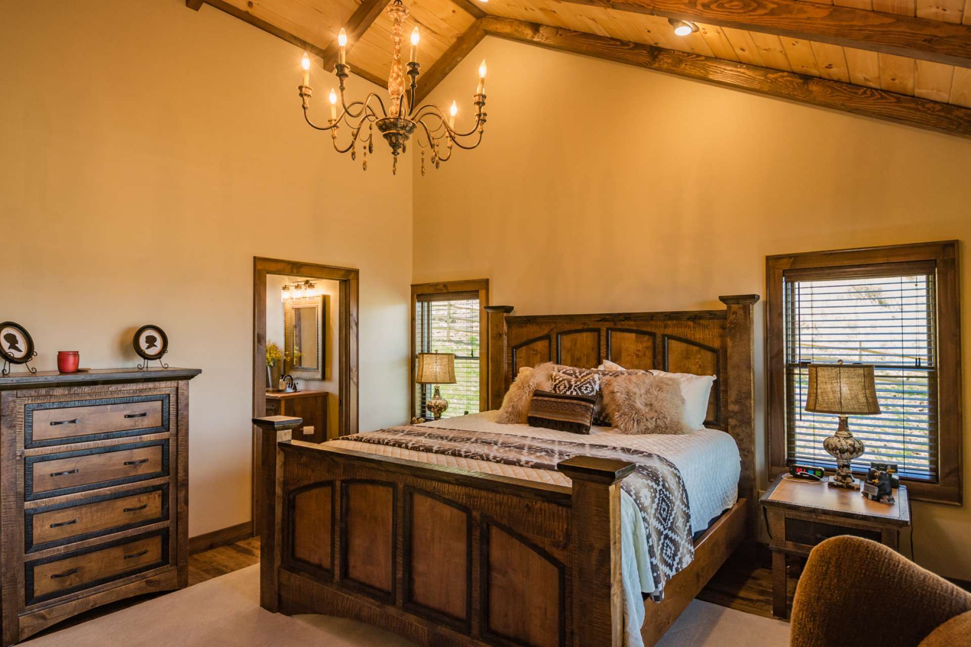 A spacious master suite is located on the main level and features  a private bath and  private access to the  open deck, perfect place to greet the day  with  morning's first cup of coffee or reflect at the end of the day with your favorite beverage.