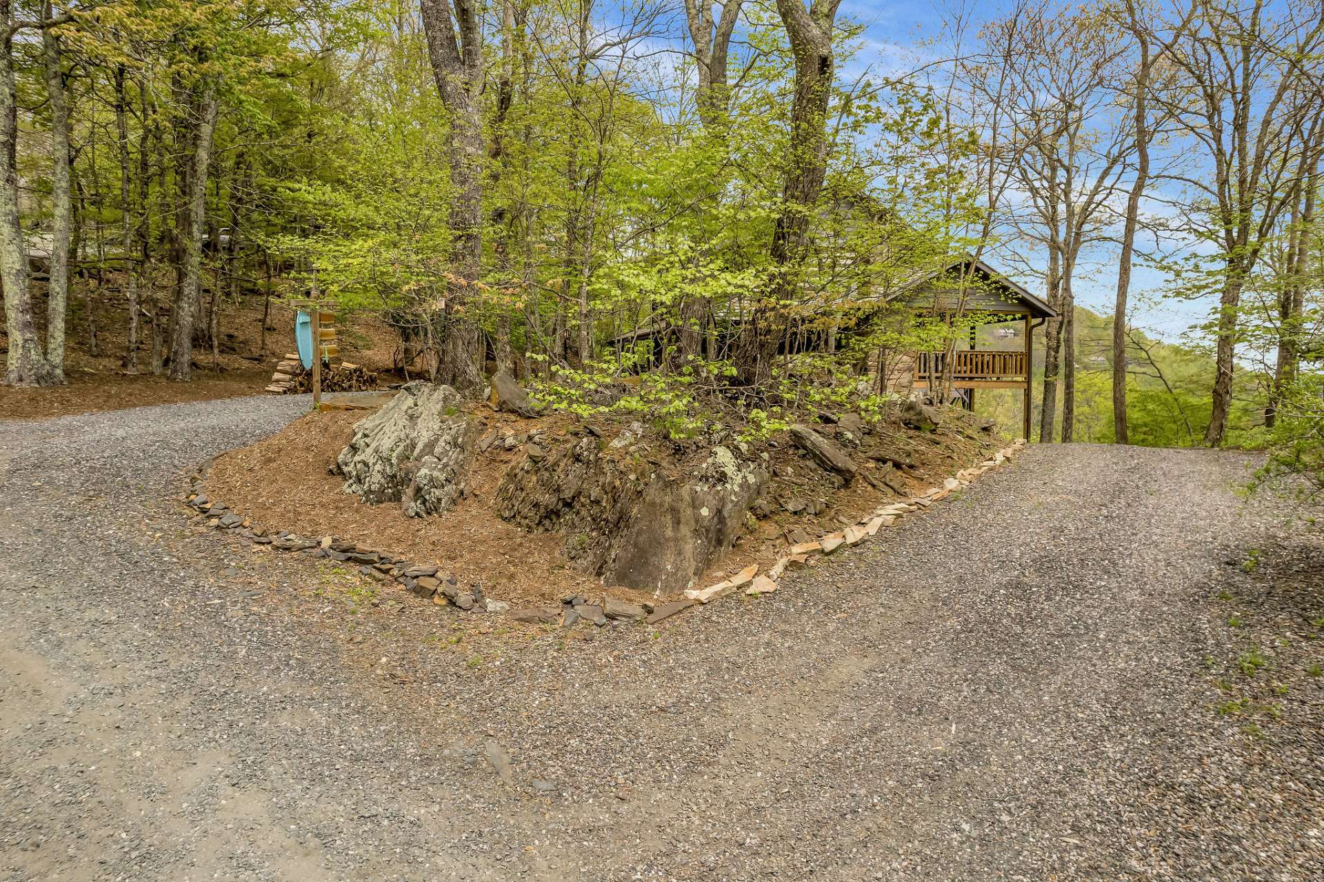 Upper and lower level driveways with covered parking for your UTV.