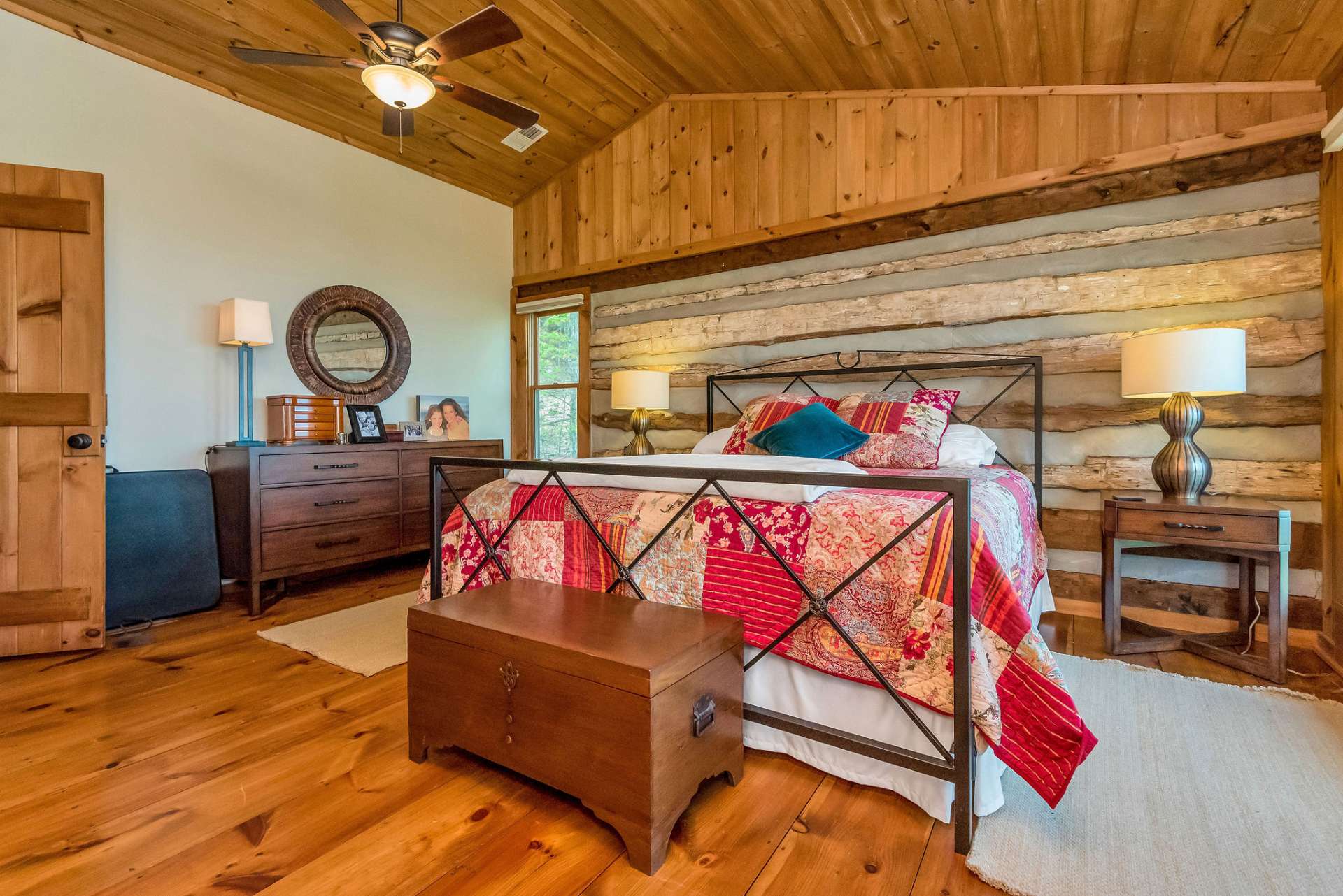 The second bedroom offers your guests the ambiance only a natural stone wood burning fireplace can give.
