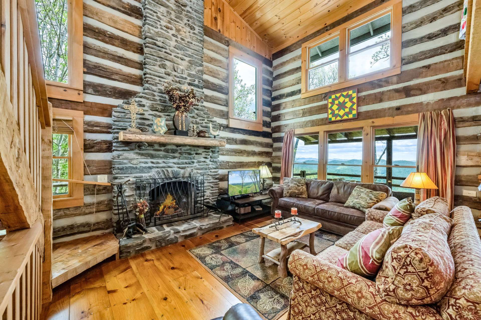 This native stone fireplace is the heart of the home.