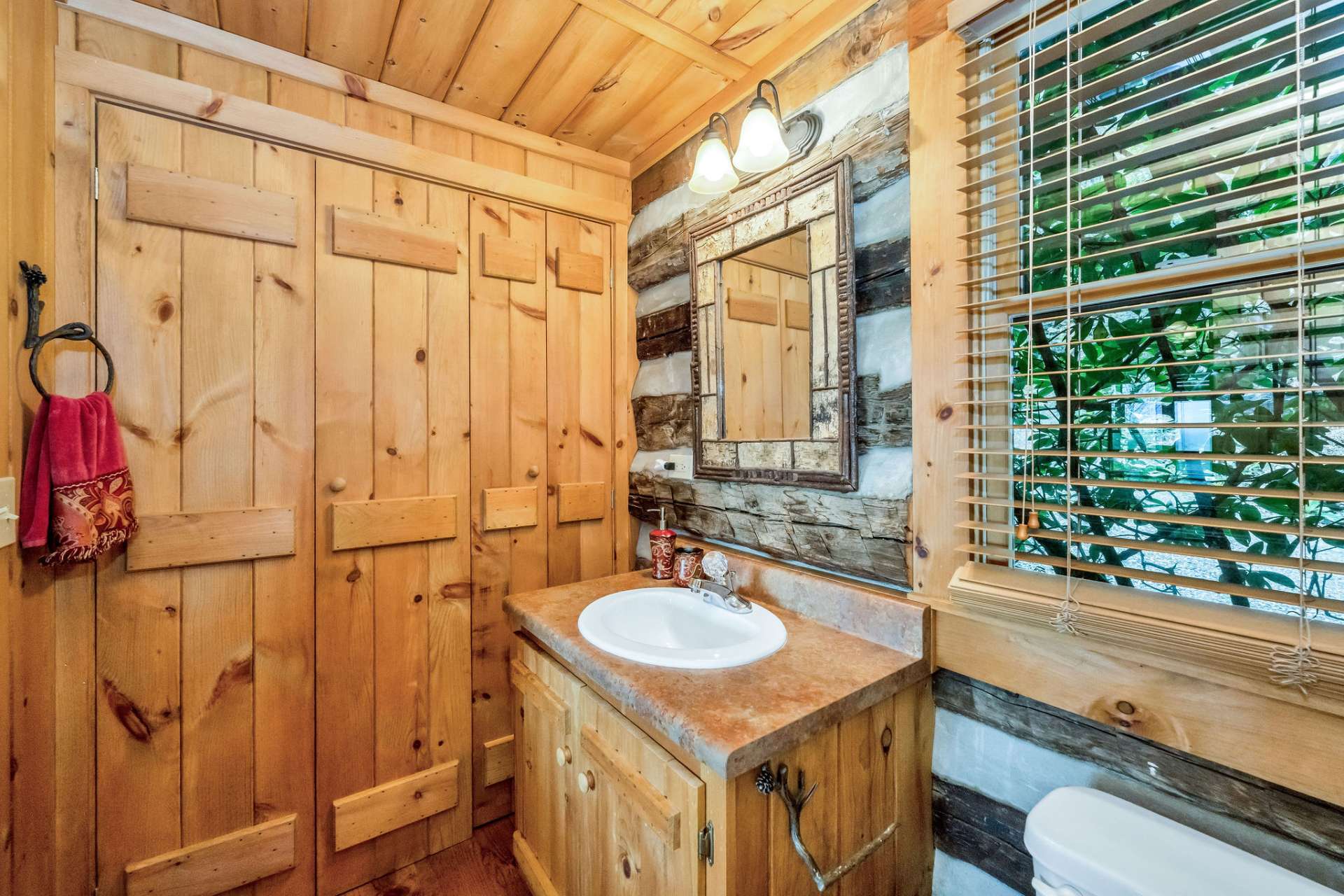 The primary full bath with laundry is an added convenience.