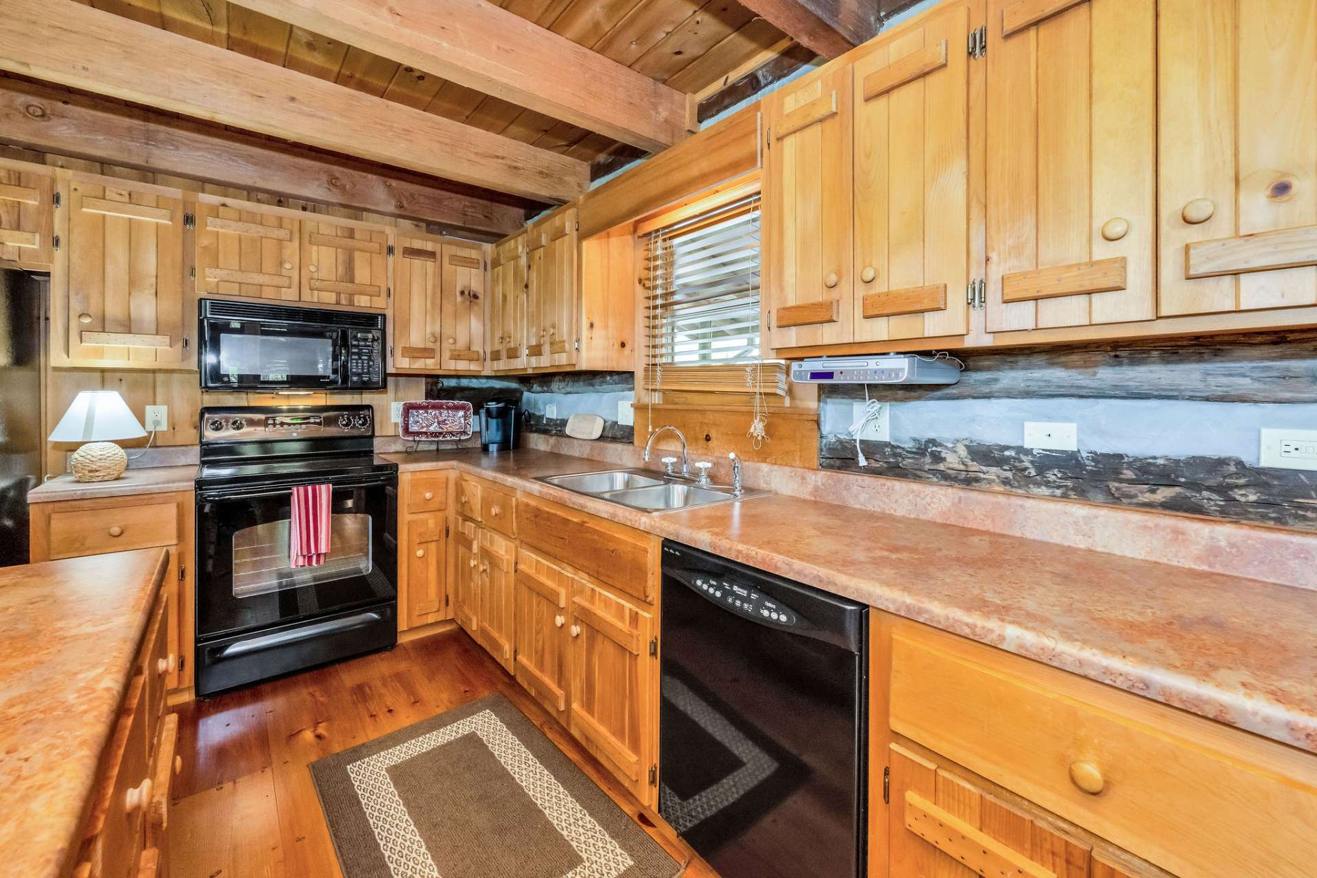 Ample storage and counter space in this stylish kitchen.