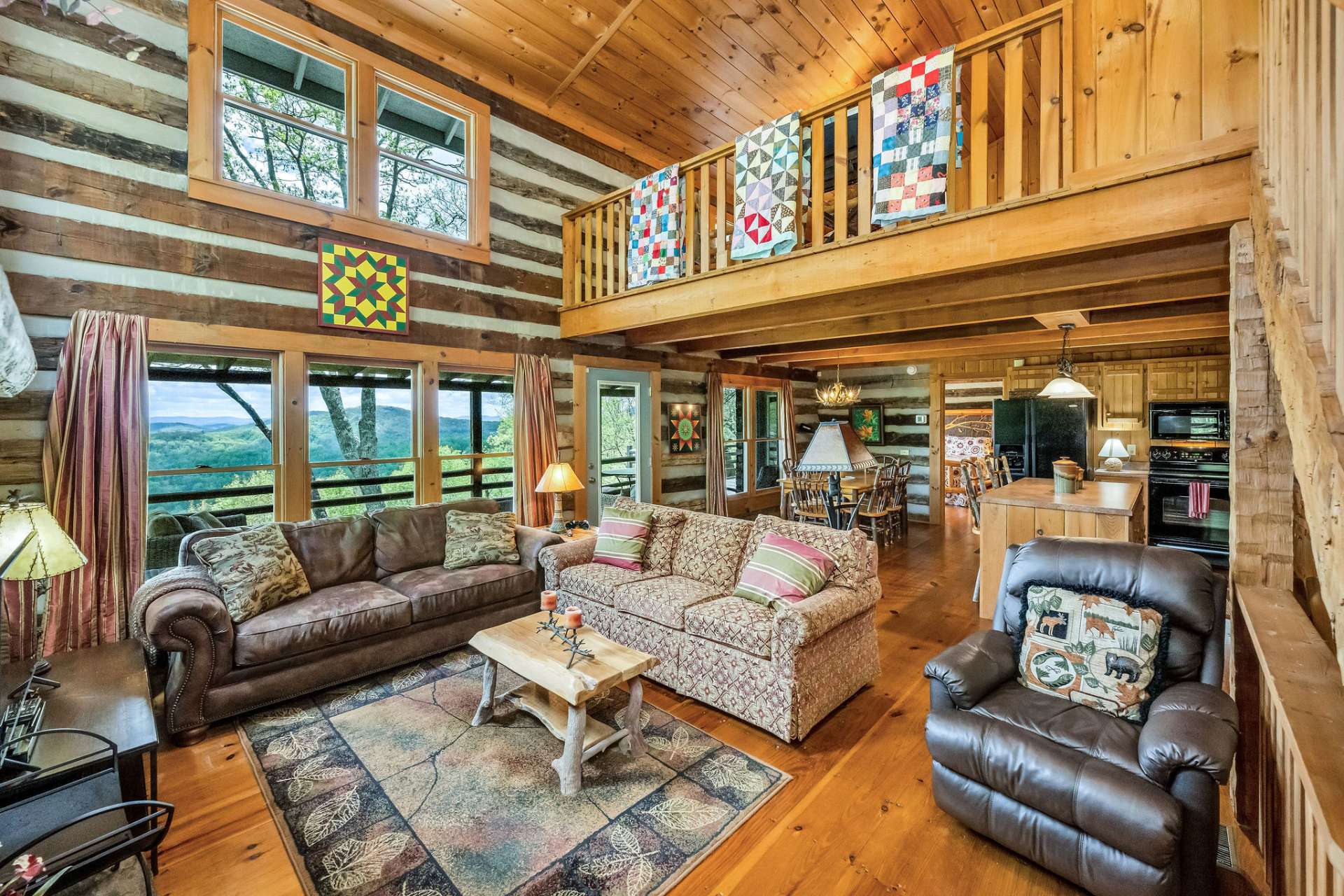 A stunning wall of windows captures the view like a living canvas, showcasing the majesty of the mountains in every season.