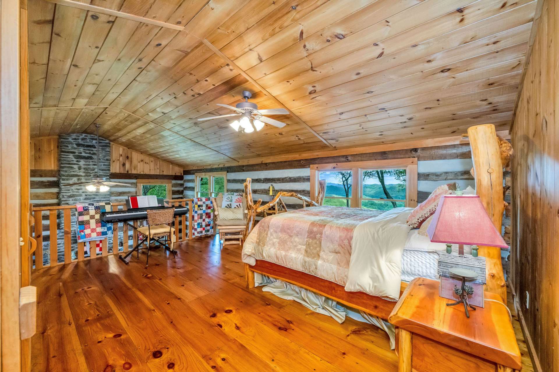 The open loft is currently being used as a sleeping area. Your guests will enjoy waking up and falling asleep surrounded by natural beauty.