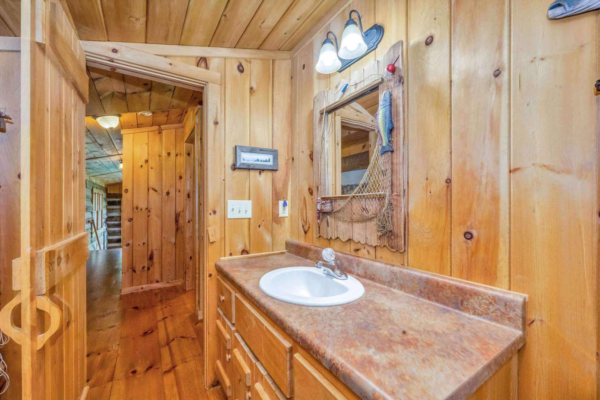A guest full bath on the second level.