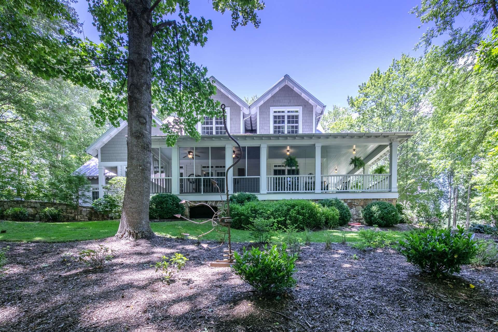 The quality of construction and design, along with the picturesque setting and mountain views, will create a dramatic and lasting impression on friends and family fortunate enough to spend time on your front porch.