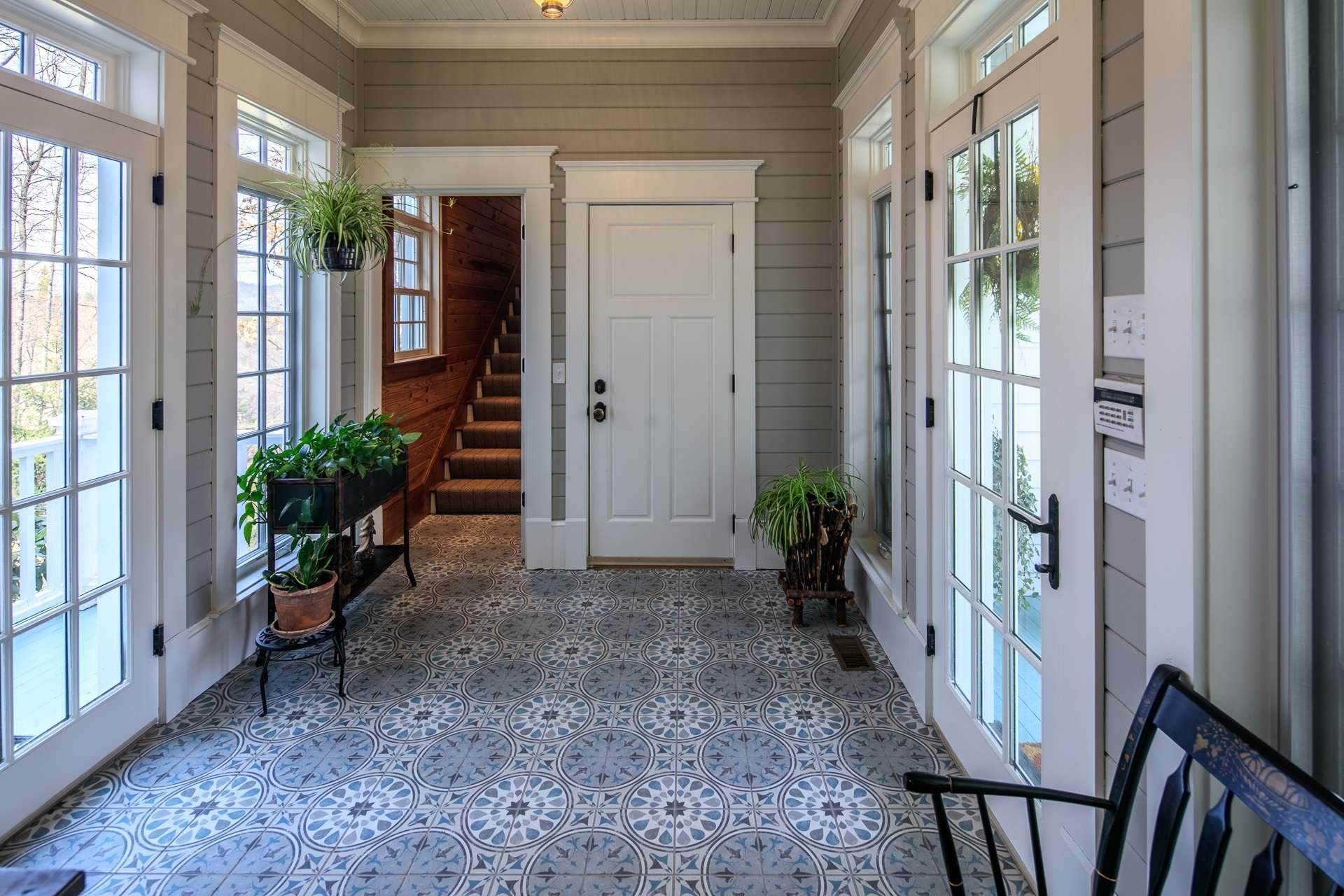 A large mudroom provides a more casual entrance, from both the front and back of the home, and also access to the spacious bonus room over the garage.