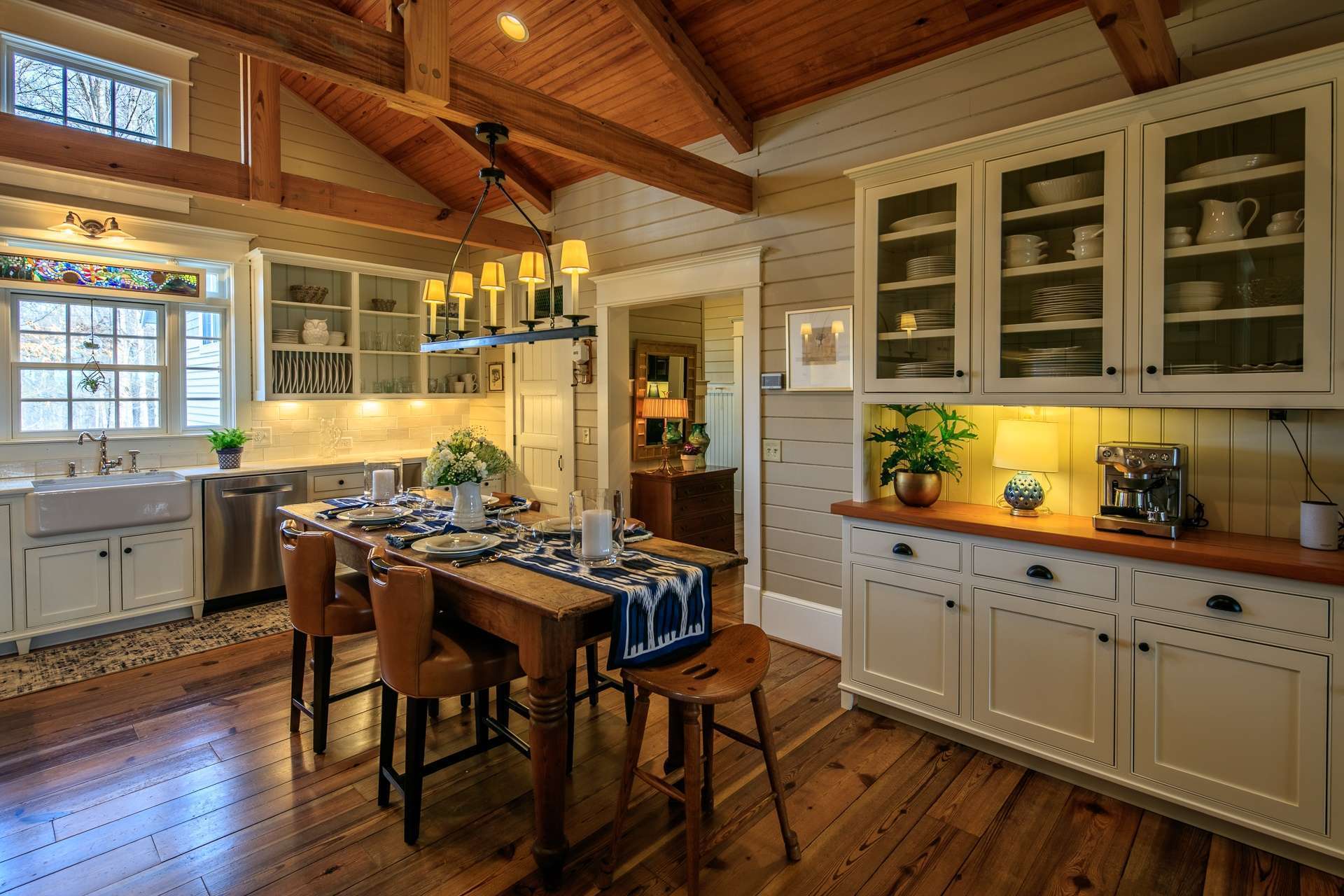 The kitchen offers more than ample work and storage space, including a walk-in pantry, and leaves plenty of room for help with meal preparation.