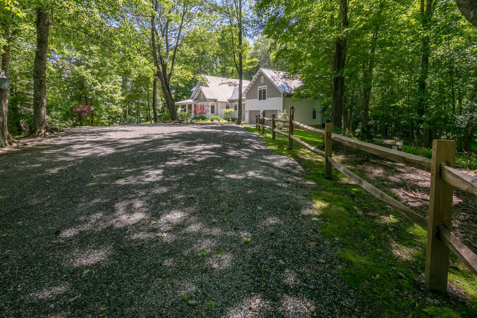 Beyond the gated entrance of The Ridge at Chestnut Hill, privacy abounds and natural beauty controls the scenery.