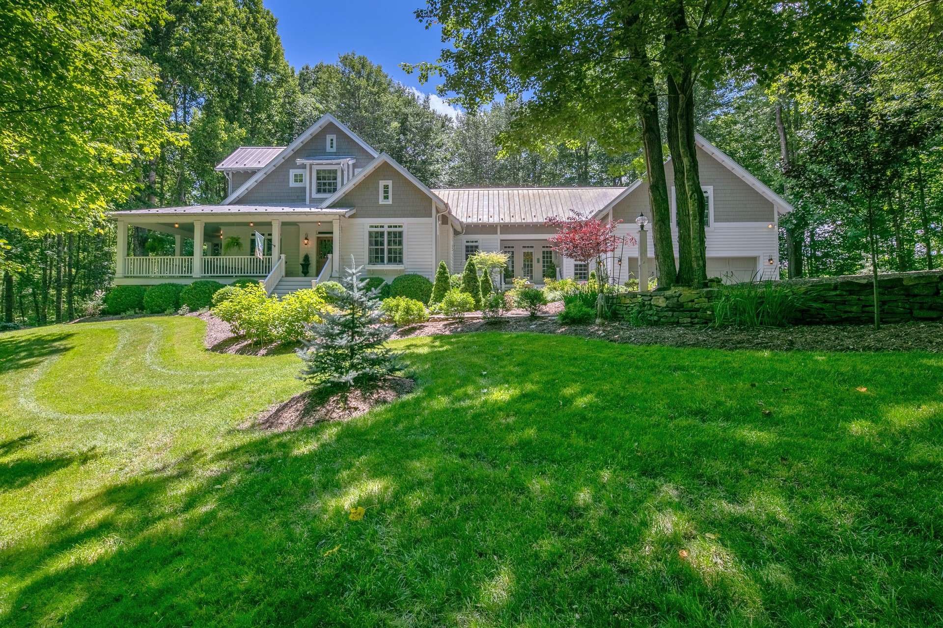 <b>This fabulous modern farmhouse majestically sited on 15+ acres in a private gated community convenient to West Jefferson, Boone, The New River, and many other North Carolina High Country destinations is offered at $1,100,000.  Call today for additional information or an appointment to view listing P110.</b>