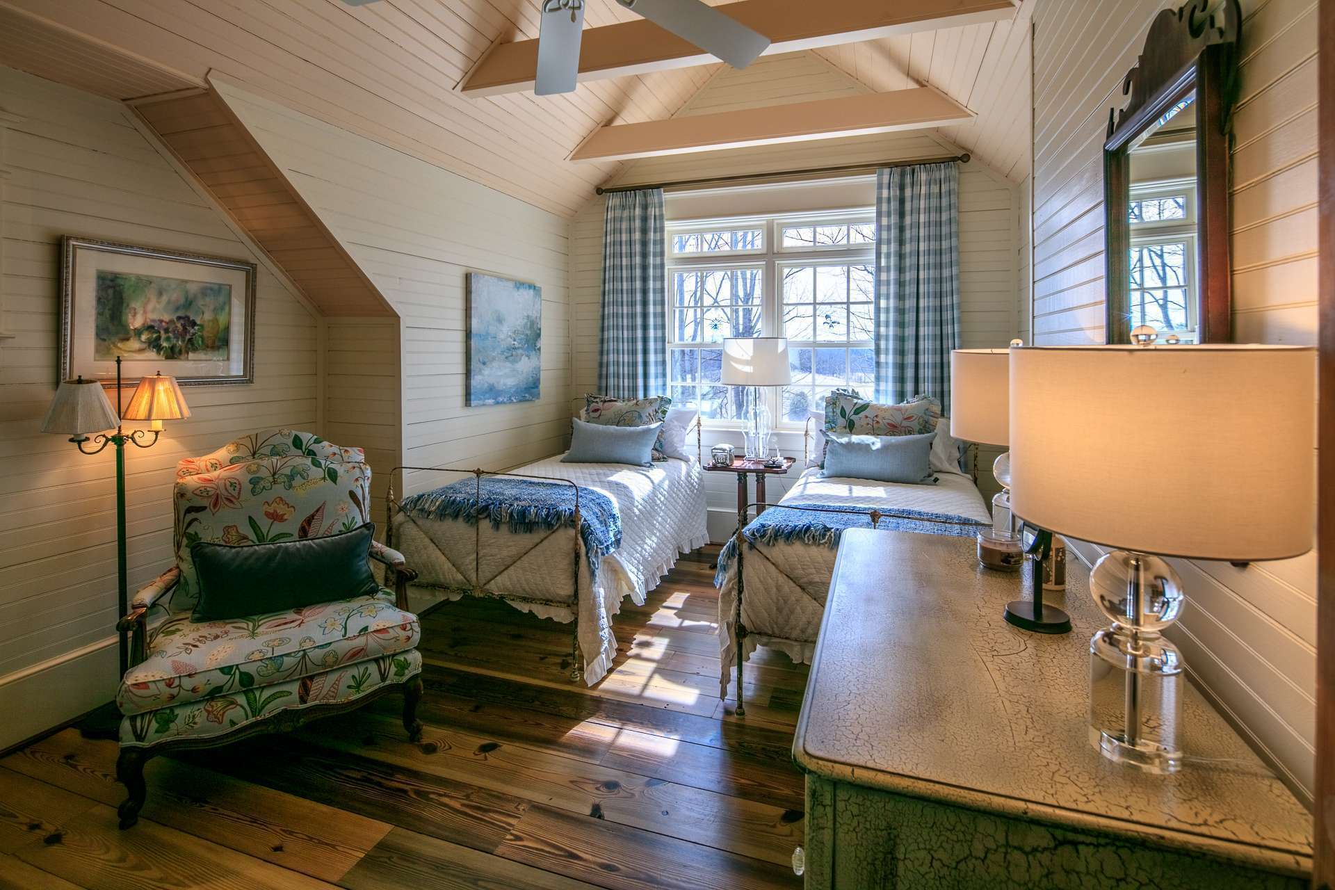 The second upper level bedroom is also full of homespun character and architectural accents.