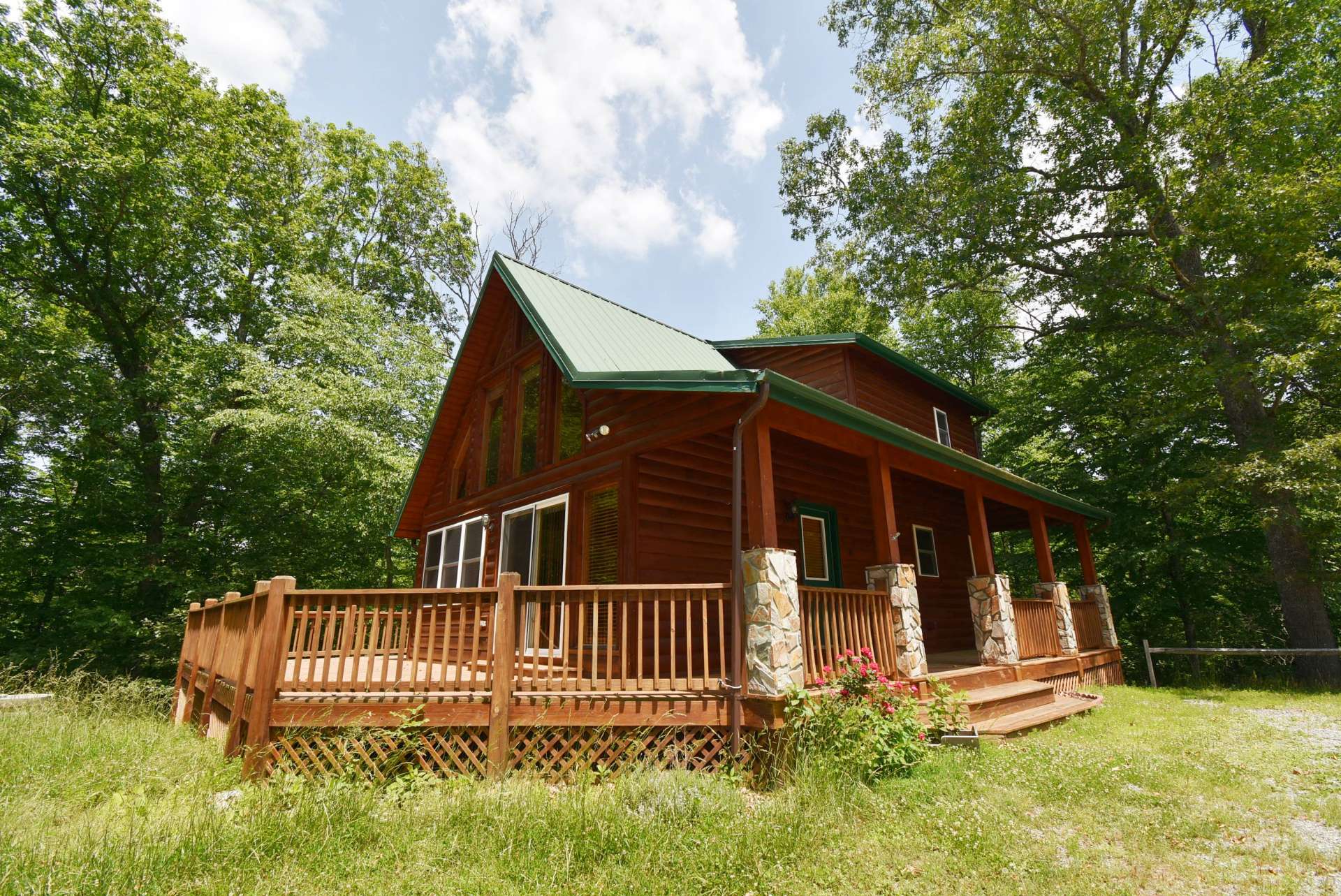 Offered at $210,000, this 2-bedroom, 2.5-bath log sided cabin nestled in a 1.34 acre setting in Deerwood Park, a private community close to the New River, a short drive into Sparta or West Jefferson, is perfect for your NC Mountain retreat and to experience mountain living. H158