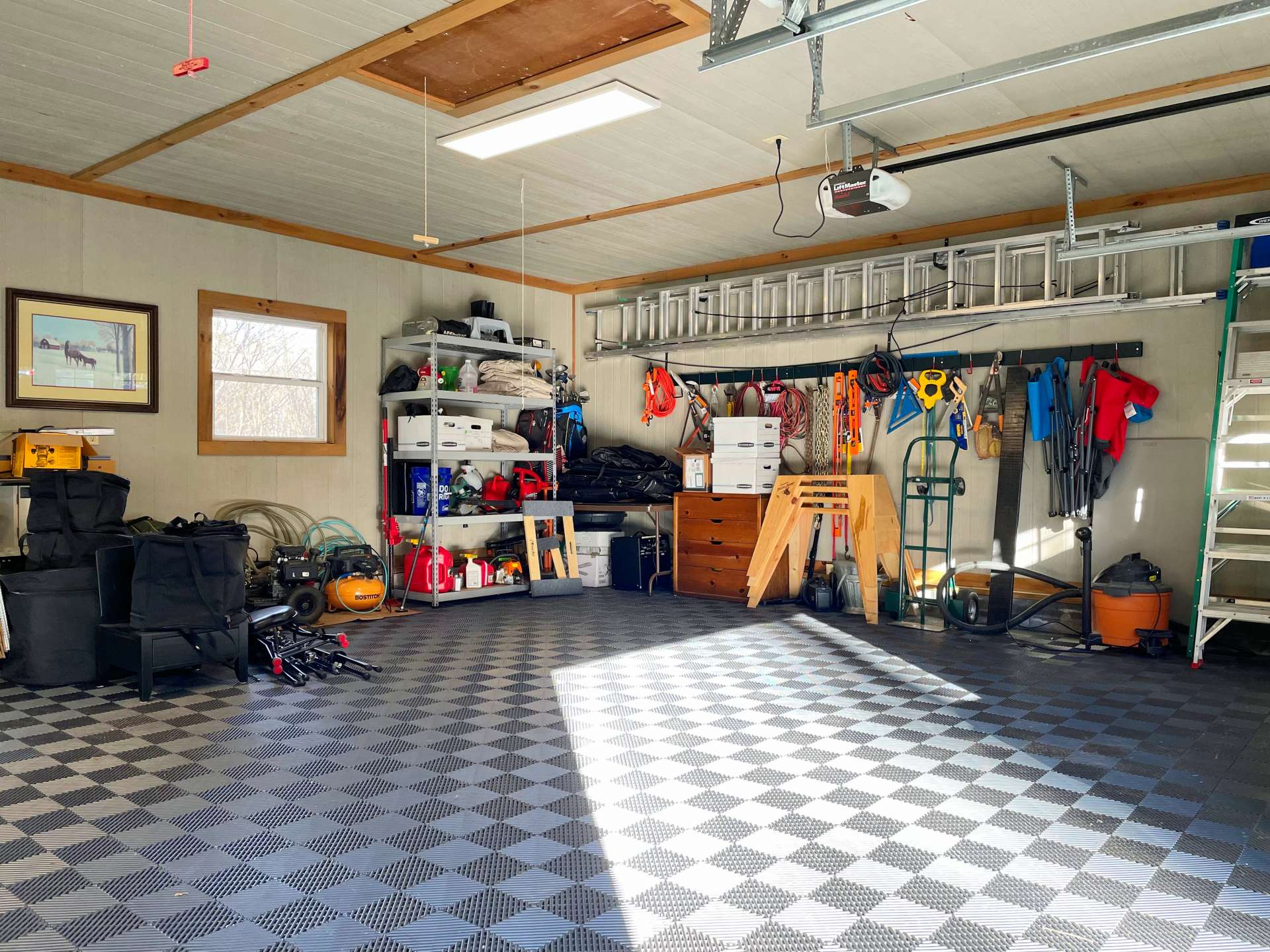 The Garage offers lots of work and storage space in addition to space for your vehicles or other mountain toys.