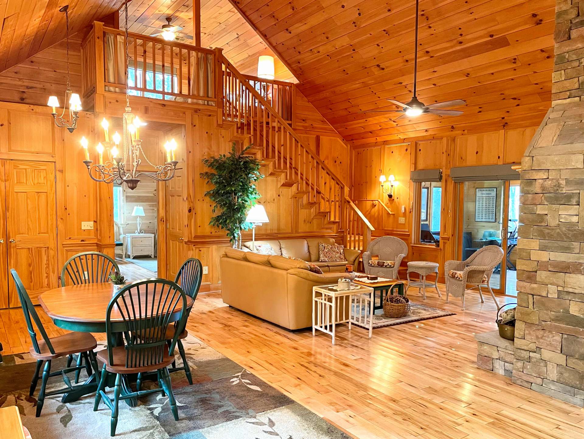 Living area with cathedral ceilings.