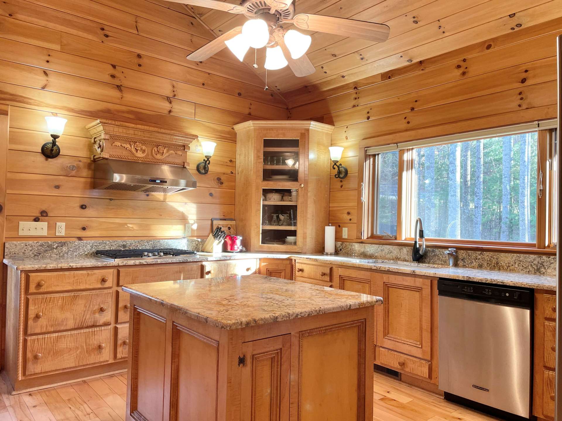 Chef's kitchen with granite and stainless appliances.